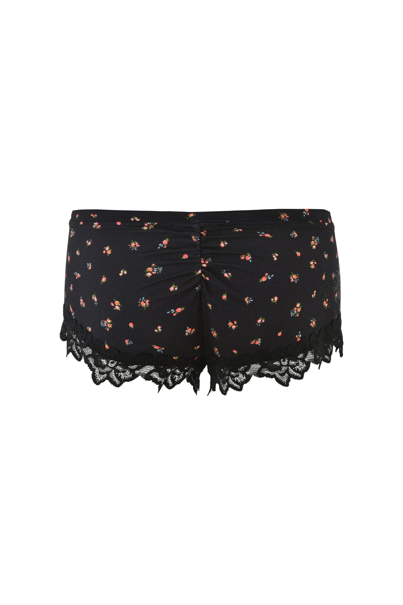 The CELESTE SHORT - BLACK: DITSY FLORAL by I.AM.GIA presents a stylish bodycon silhouette with black shorts, a small floral print, and lace-trimmed hem. The micro-mini length highlights the ruched front fabric, adding texture and flair.