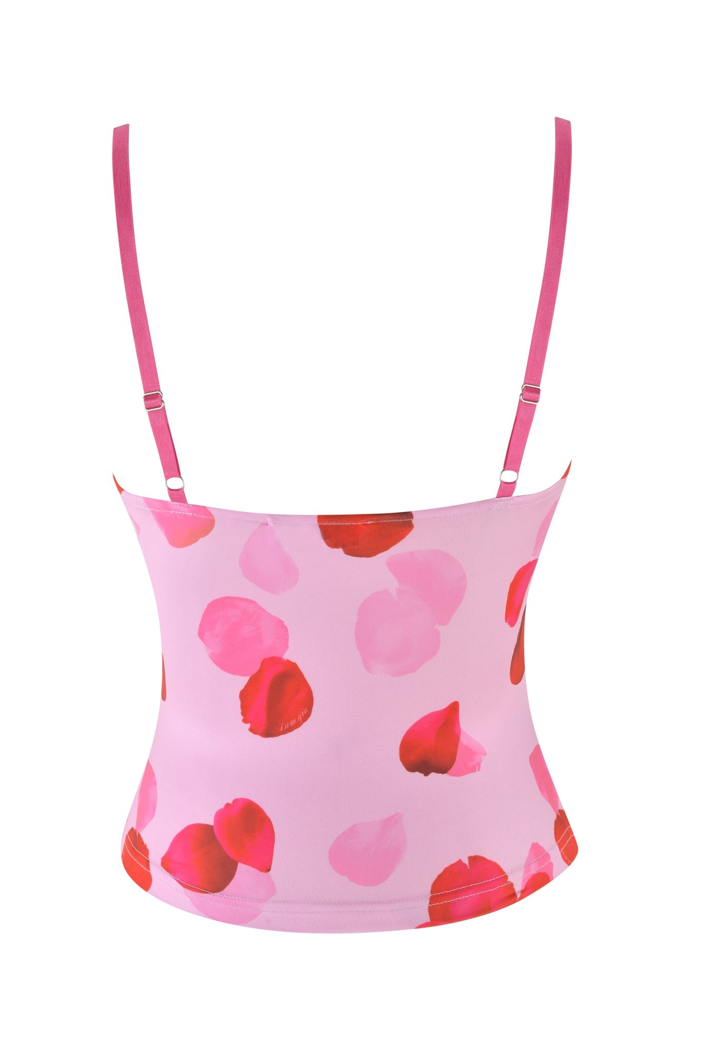 The ODETTA TOP - PINK : PRETTY PETAL by I.AM.GIA is a charming pink camisole adorned with thin straps and a captivating rose petal print in red and pink shades on a white background, exuding elegance and charm.