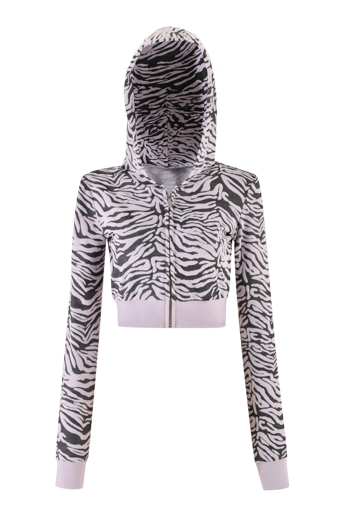 Image of the SOLIS HOODIE - PINK : ZEBRA from I.AM.GIA. The women's cropped hoodie showcases a zebra ombre print design with pink, black, and white stripes. It features long sleeves and a front zipper, with the hood up against a plain white background.