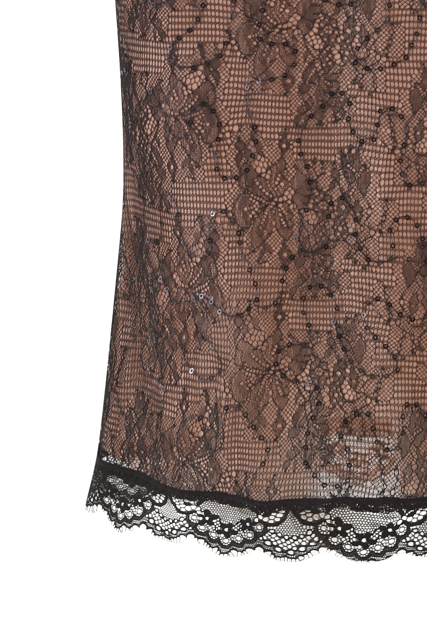 A close-up of the BIJOU MIDI SKIRT - BLACK : LACE by I.AM.GIA, highlighting its sheer black sparkle lace fabric adorned with intricate floral patterns and a scalloped lace hem. The delicate, see-through quality of the lace subtly reveals the background through the fabric. This piece is designed as a midi pencil skirt with a mid-rise fitted silhouette.