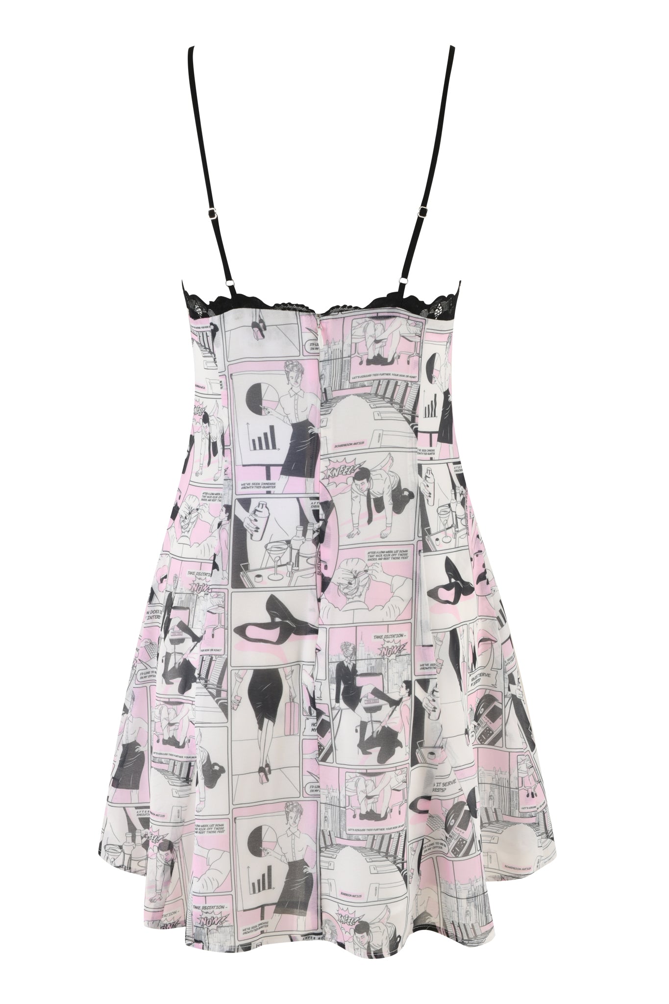 The ROSIE DRESS - PINK : DIGITAL:COMIC PRINT by I.AM.GIA is a sleeveless Georgette mini dress with thin spaghetti straps and black lace trim along the neckline. It boasts a custom hand-drawn comic book print in black and white with pink accents, depicting various cartoon-style characters and scenes. The hemline is slightly flared.