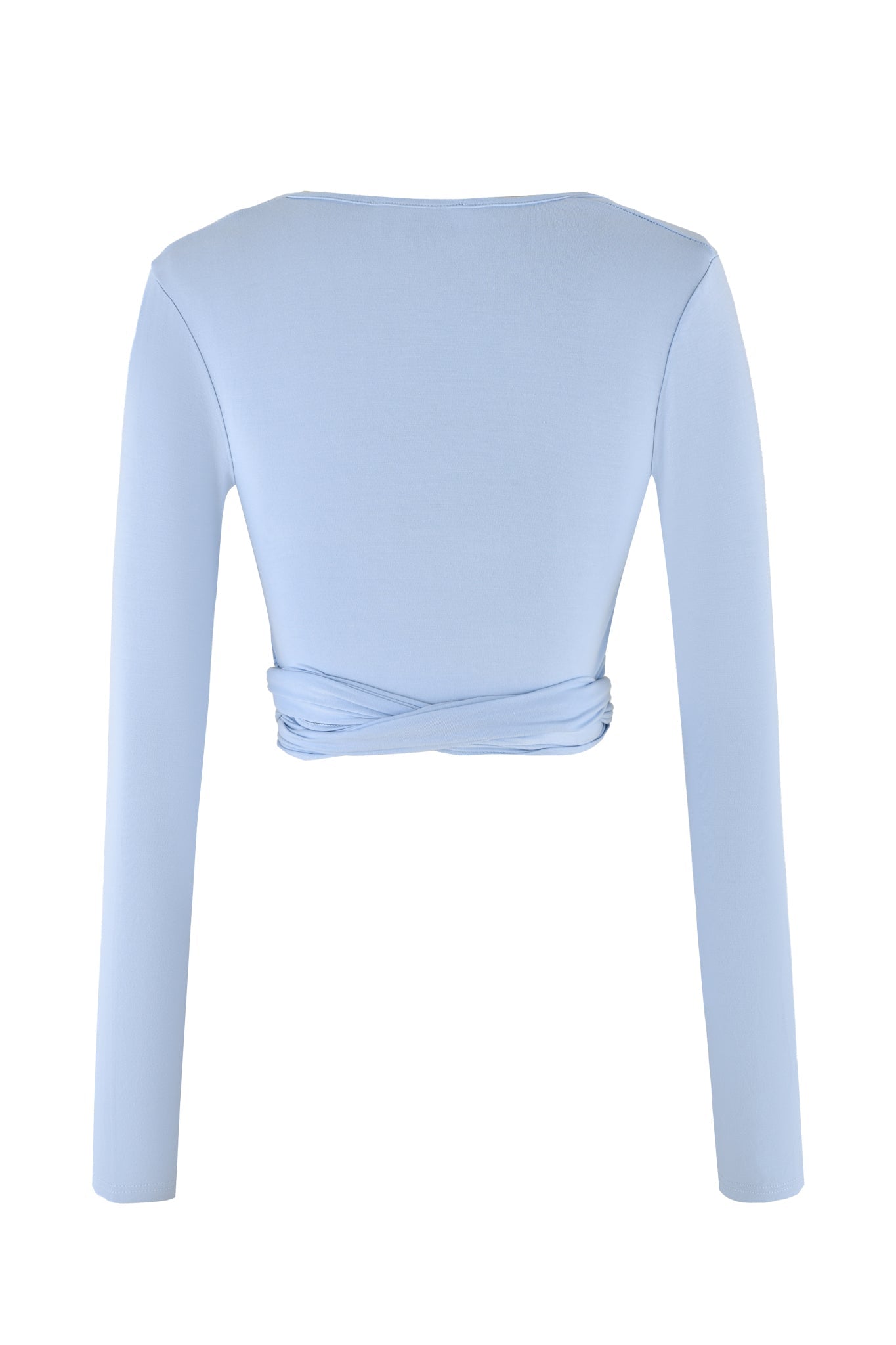 The AMRIA TOP - BLUE from I.AM.GIA, in a stunning powder blue shade, features an off-the-shoulder design and long sleeves. This bodycon fit crop top is adorned with a front tie knot that creates elegant pleats around the chest area. Notably, the image only shows one sleeve, showcasing its chic asymmetrical style.