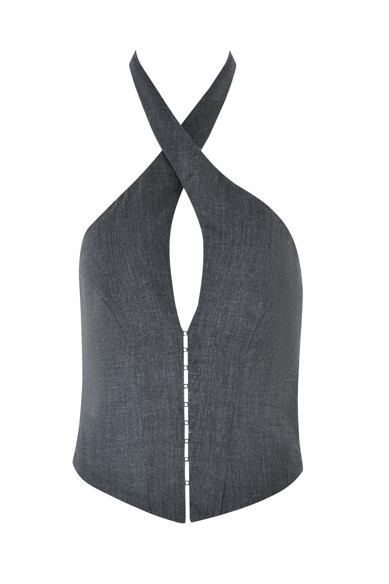 A close-up of the ADRIETTE TOP - GREY by I.AM.GIA showcases its bodycon silhouette and crisscross halter neckline. The fabric features a subtle denim or charcoal texture. At the front, the neckline crosses over, creating a small teardrop-shaped cutout that gives it an elegant tailored look.