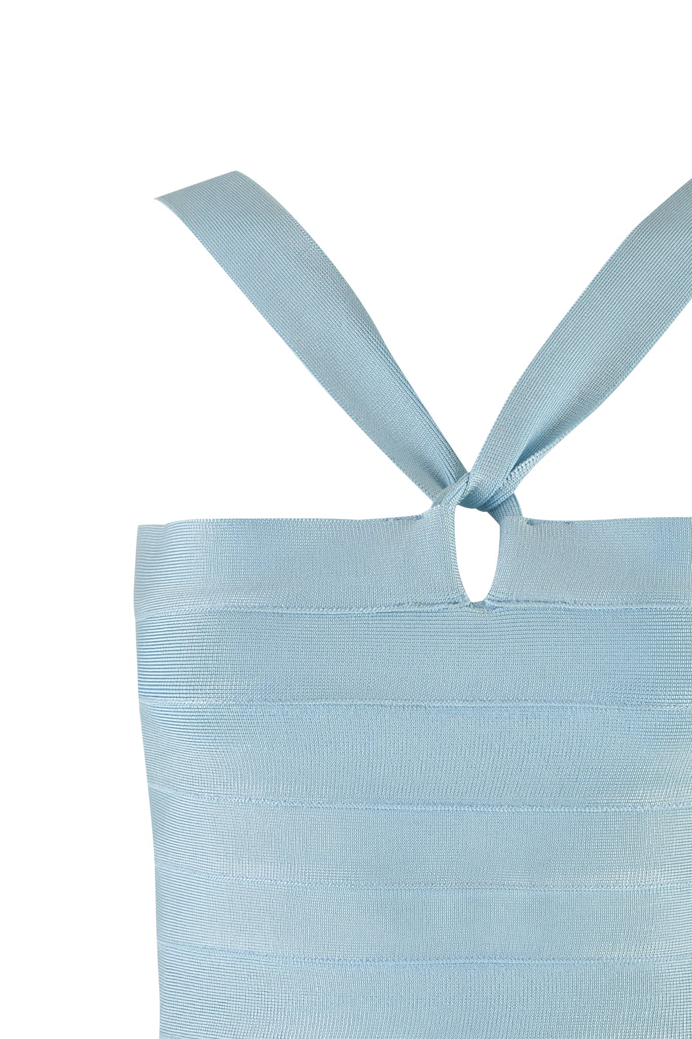 Close-up of the VESPERA TOP - BLUE by I.AM.GIA in a powder blue shade. This sleeveless top features a keyhole cutout in the front and thick straps tied at the shoulders, boasting a ribbed texture that offers a bodycon fit to beautifully complement your silhouette.