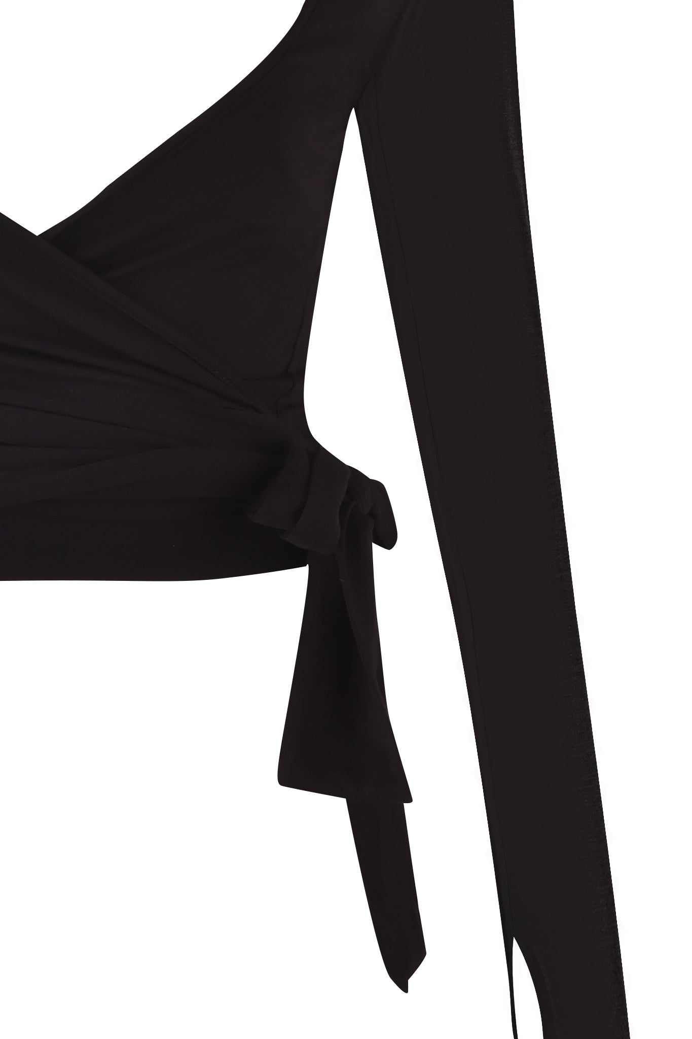 A close-up of the MANDY TOP - BLACK from I.AM.GIA shows its long sleeves and stylish wrap-around design with a tied knot at the side. The super soft stretch bamboo fabric appears smooth and slightly stretchy, providing a sleek, elegant look.