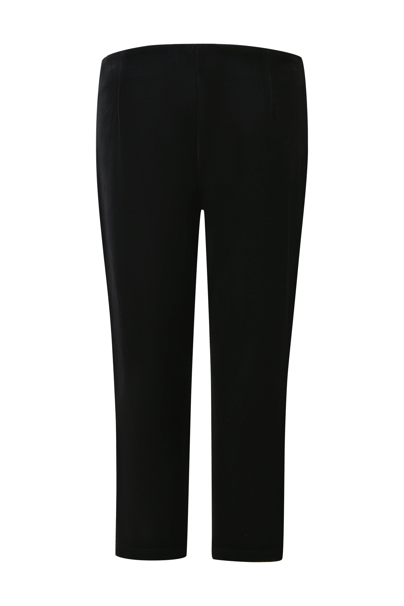 A pair of LAURA VELVET LEGGINGS - BLACK by I.AM.GIA is shown from the back. These leggings feature a low-rise waist and are plain with no visible pockets or embellishments. The velvet fabric appears smooth, giving a clean and classic look.