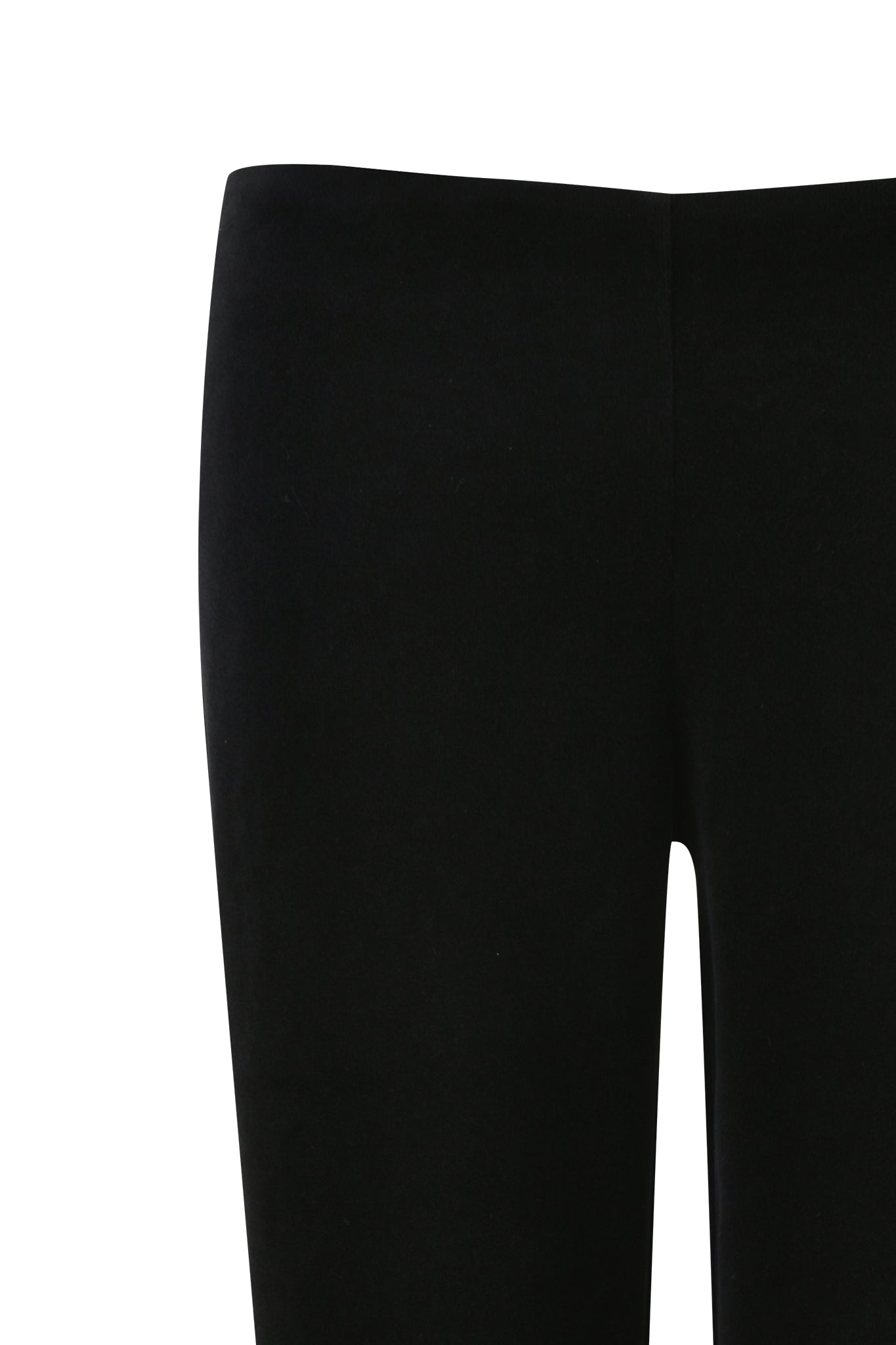 Close-up view of the LAURA VELVET LEGGING - BLACK by I.AM.GIA. The velvety fabric appears smooth, and the leggings are displayed against a plain white background. Focusing on the upper section, they showcase a simple, minimalistic design with a low-rise waist.