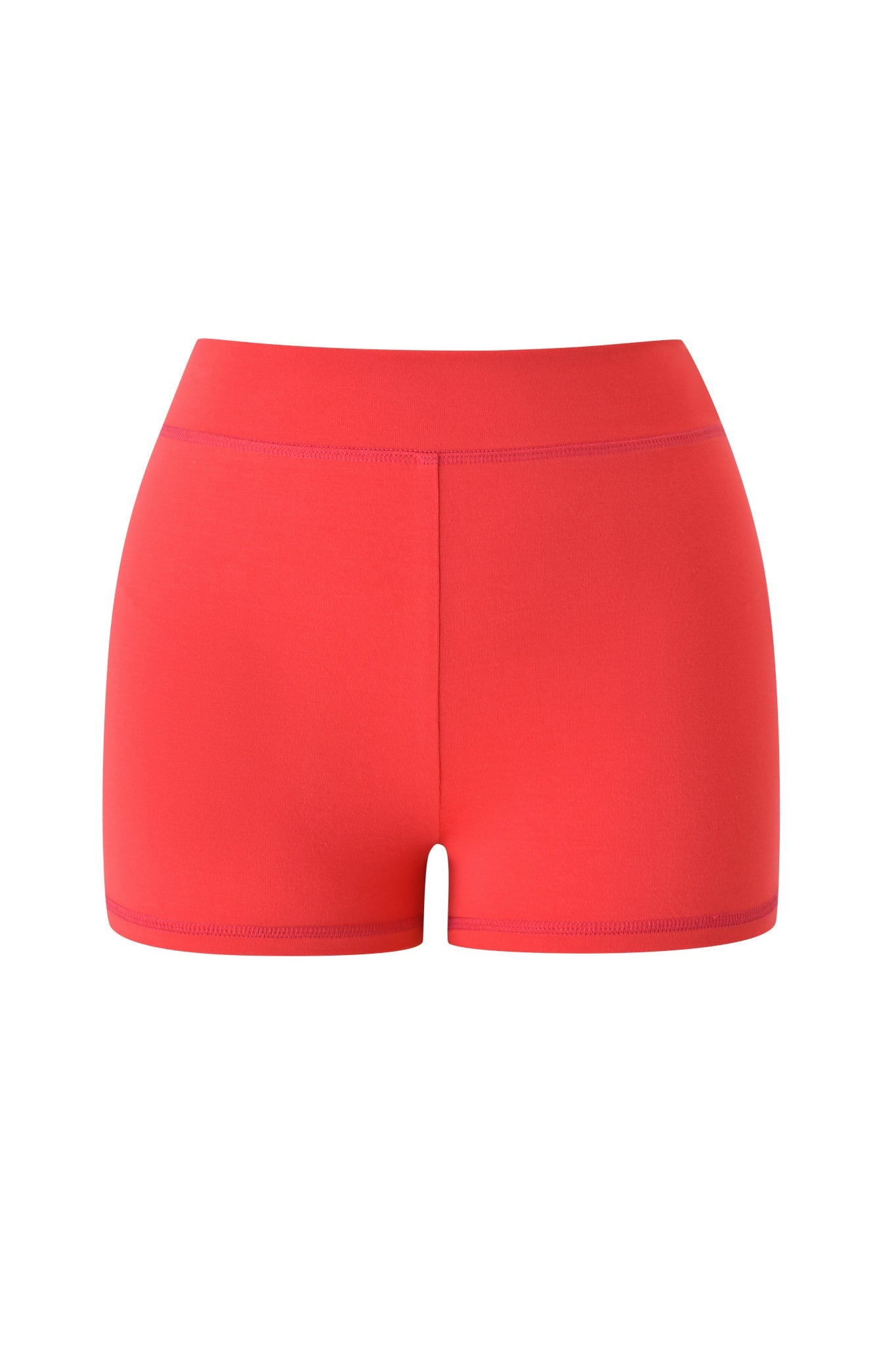 The I.AM.GIA BLARE SHORT - PAPAYA features a bright red, high-waisted fitted design with a seamless elastic waistband and no visible logos or patterns, shown against a plain white background.