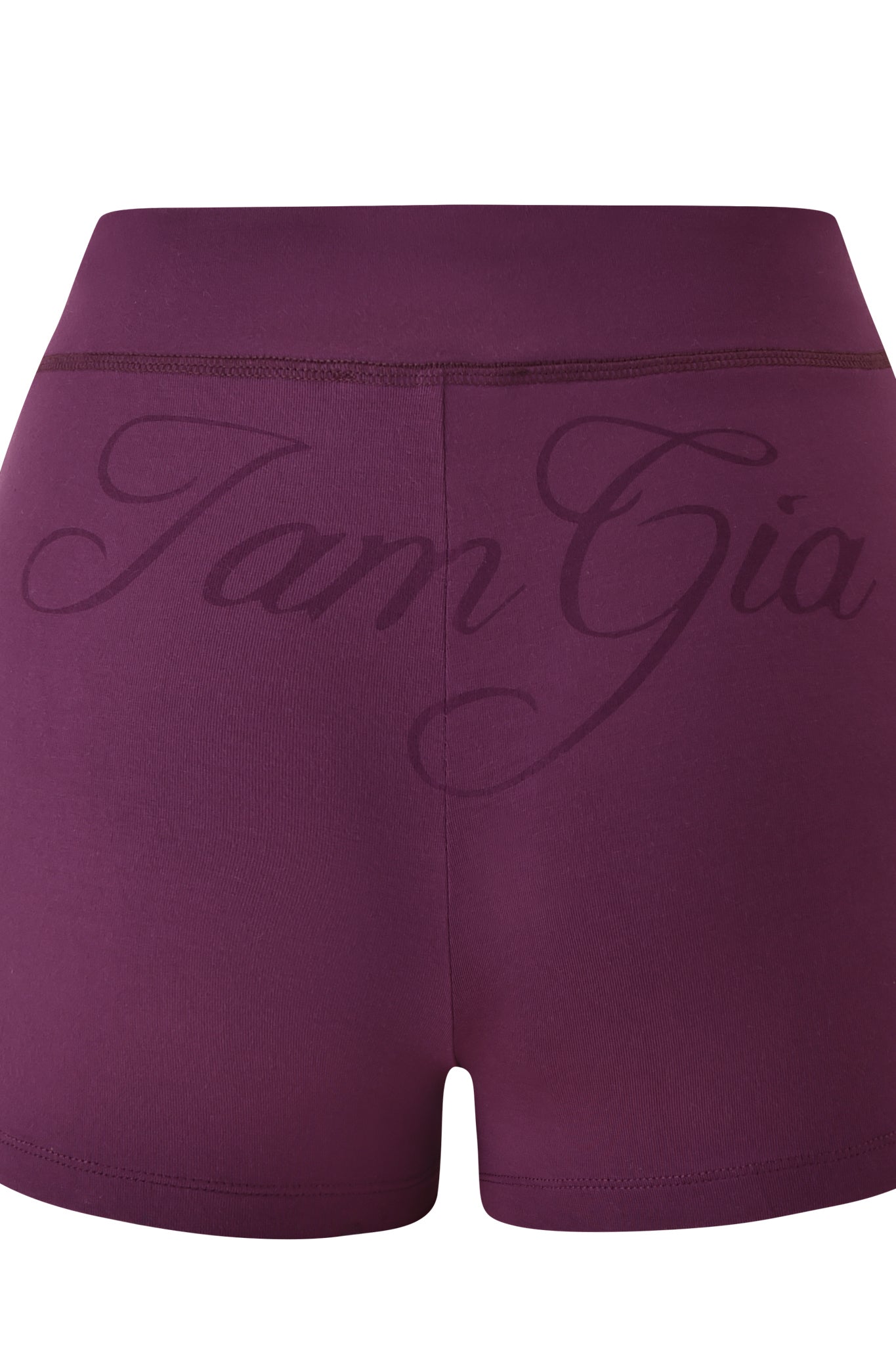 The BLARE SHORT - PLUM by I.AM.GIA features a high-waisted fit, an elastic waistband, and bold “I.AM.GIA” script across the back.