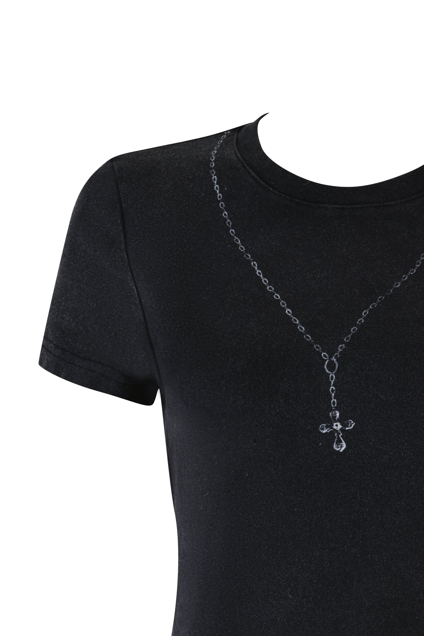 The ENZA TOP - BLACK by I.AM.GIA is a vintage baby tee that showcases a trompe l'oeil rosary print. It features a silver chain necklace with a cross pendant design, artfully displayed on an invisible mannequin to mimic the appearance of wearing the necklace directly on the T-shirt.