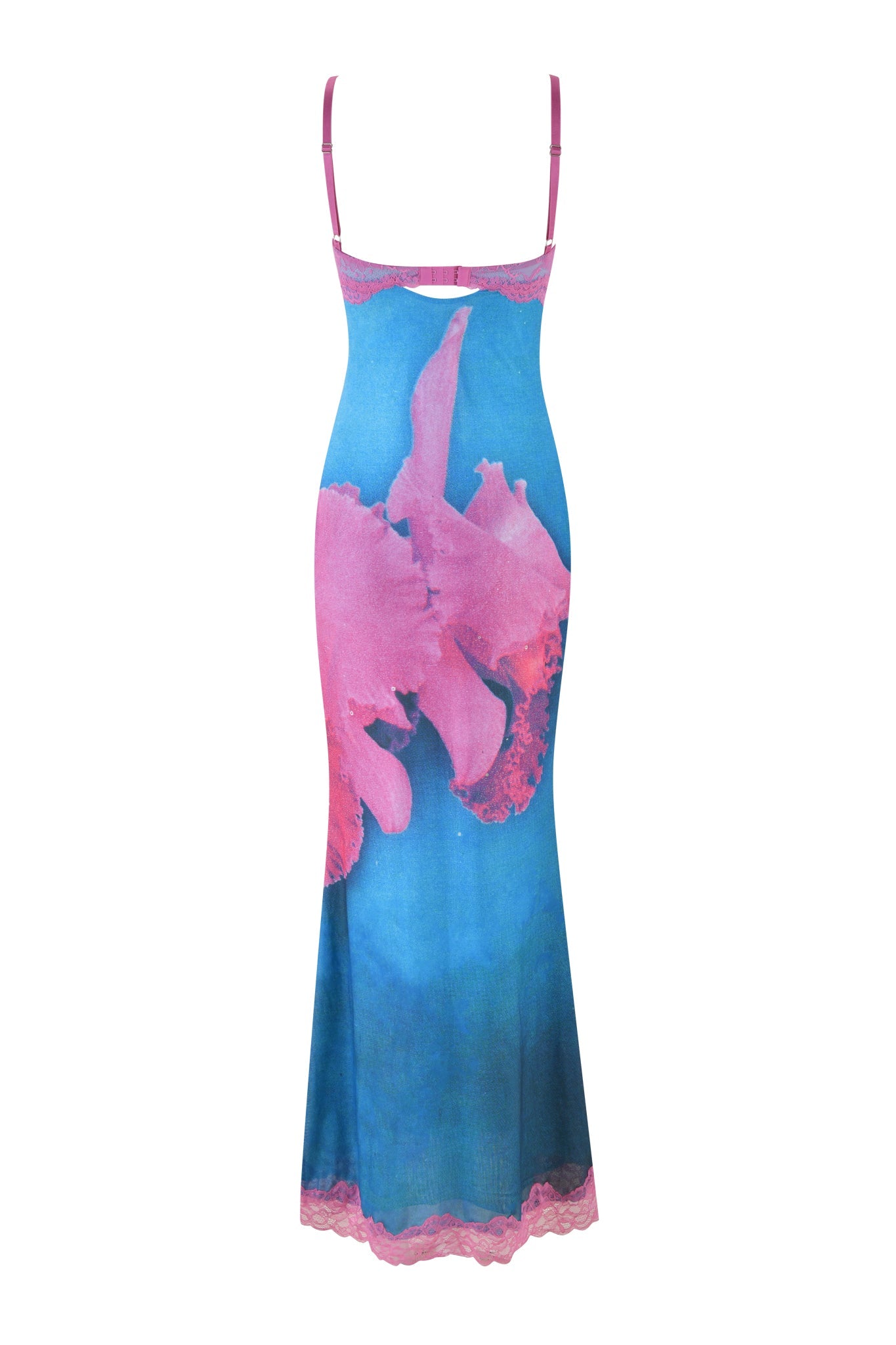 The CALYPSO MAXI DRESS - BLUE : FLORAL : BLUE ORCHID PRINT from I.AM.GIA is a sleeveless, ankle-length piece adorned with pink floral patterns on a blue background. This maxi dress showcases delicate pink lace trim at the hem and adjustable shoulder straps.