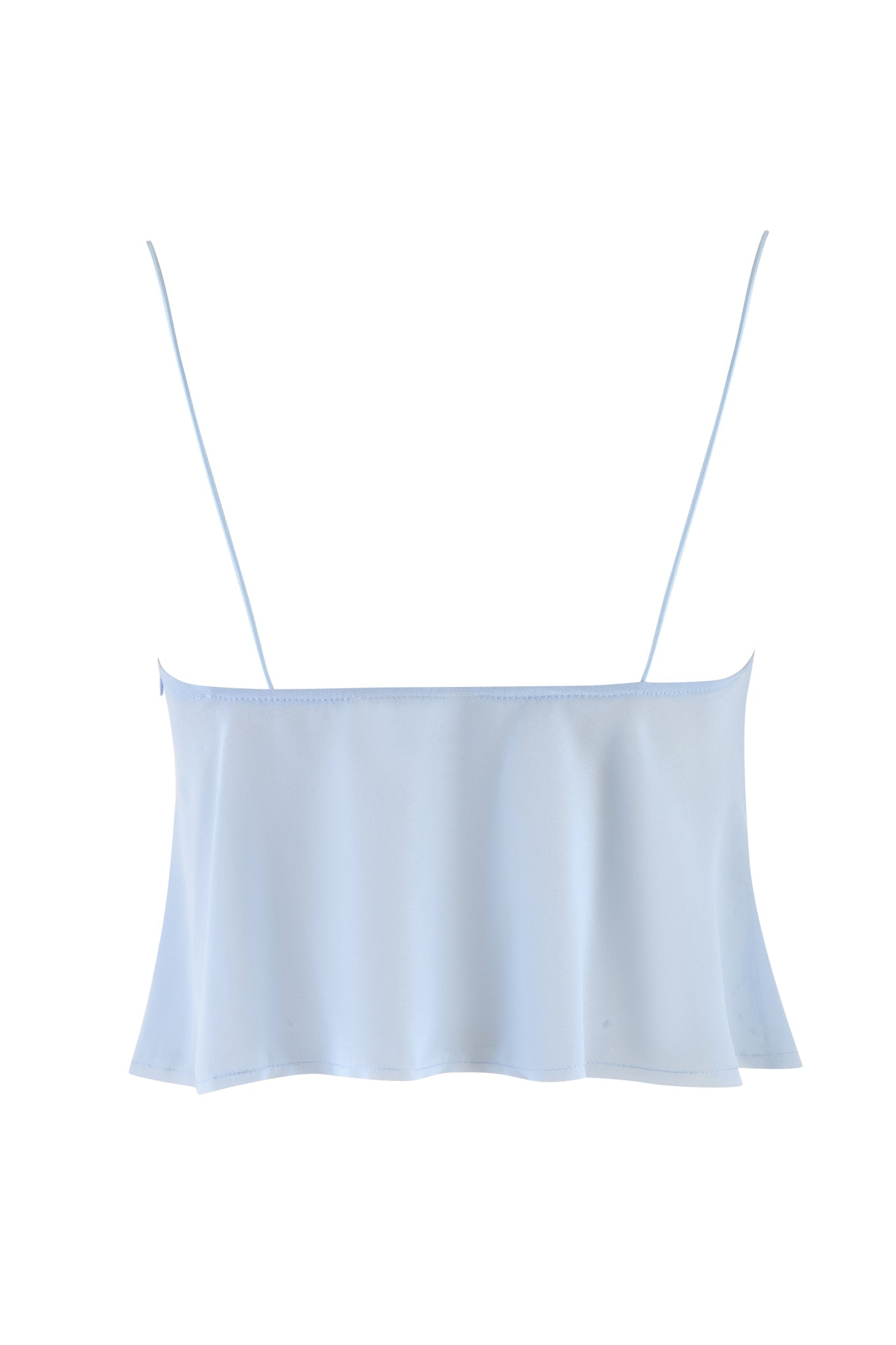 The MINA TOP - BLUE: BABY BLUE by I.AM.GIA features a light blue, sleeveless camisole design with semi-sheer georgette fabric and thin spaghetti straps, showcased against a white background. The soft material subtly flows at the hem, resembling a delicate tank top.