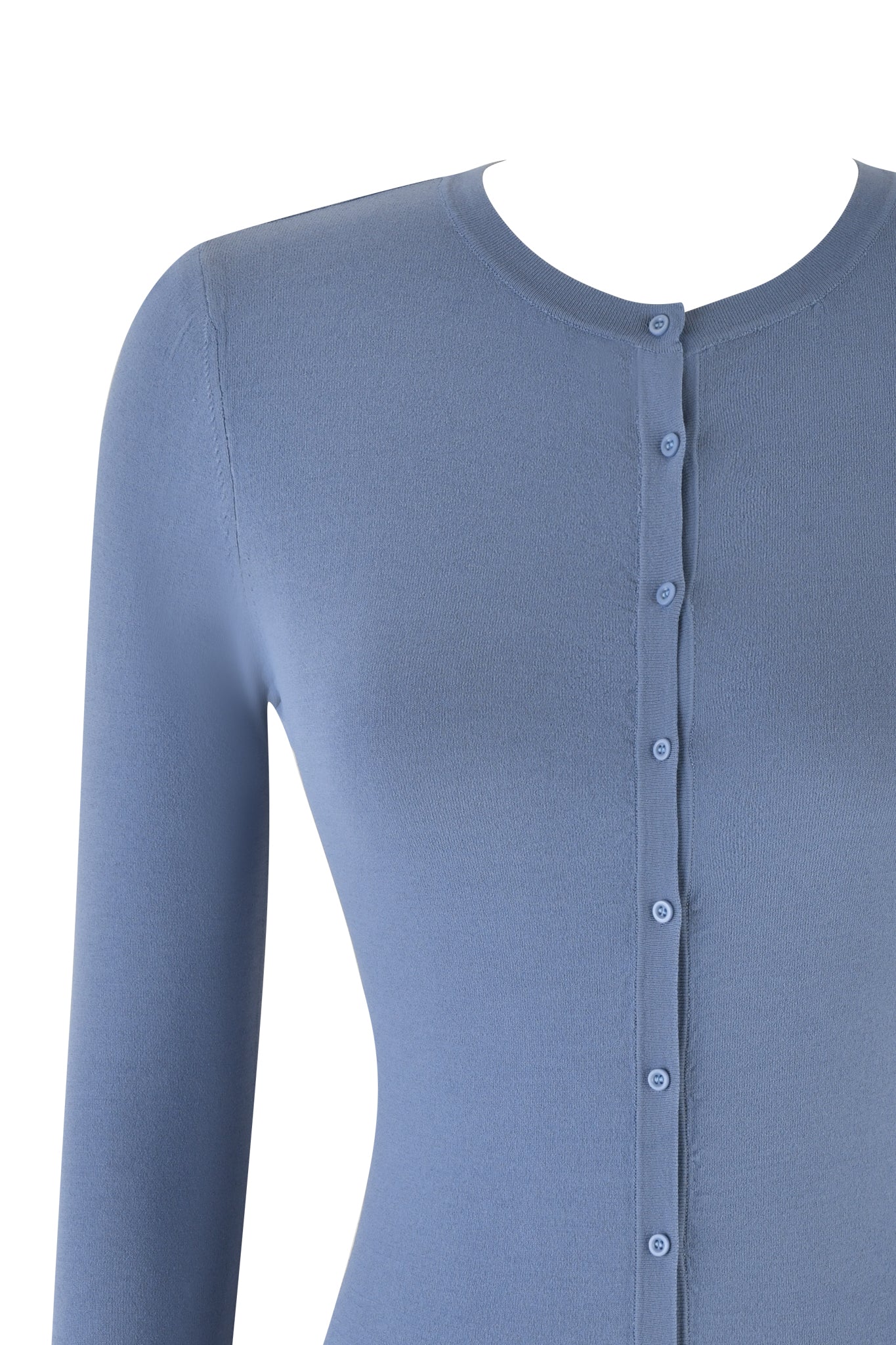 A close-up image of the I.AM.GIA AUDRINA CARDIGAN 2.0 in Steel Blue highlights its soft, smooth knit fabric and partially undone buttons, focusing on the upper torso with precision to showcase its elegance.