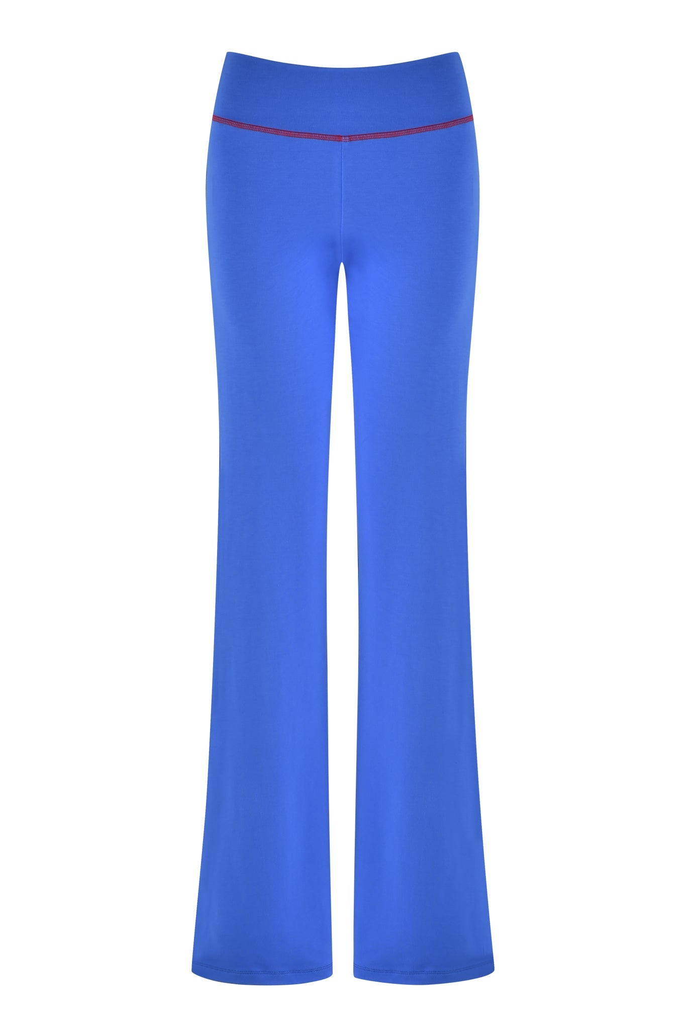 The I.AM.GIA BLARE TRACKPANT 2.0 in royal blue showcases a bold red waistband set against a crisp white backdrop.