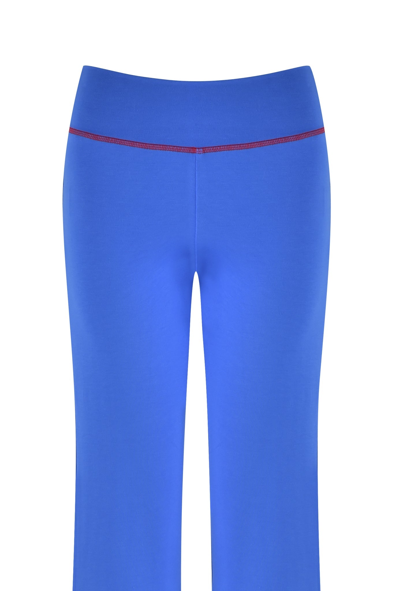 The I.AM.GIA BLARE TRACKPANT 2.0 in royal blue features a bodycon silhouette with striking red stitching on the waistband, showcased against a plain white background.