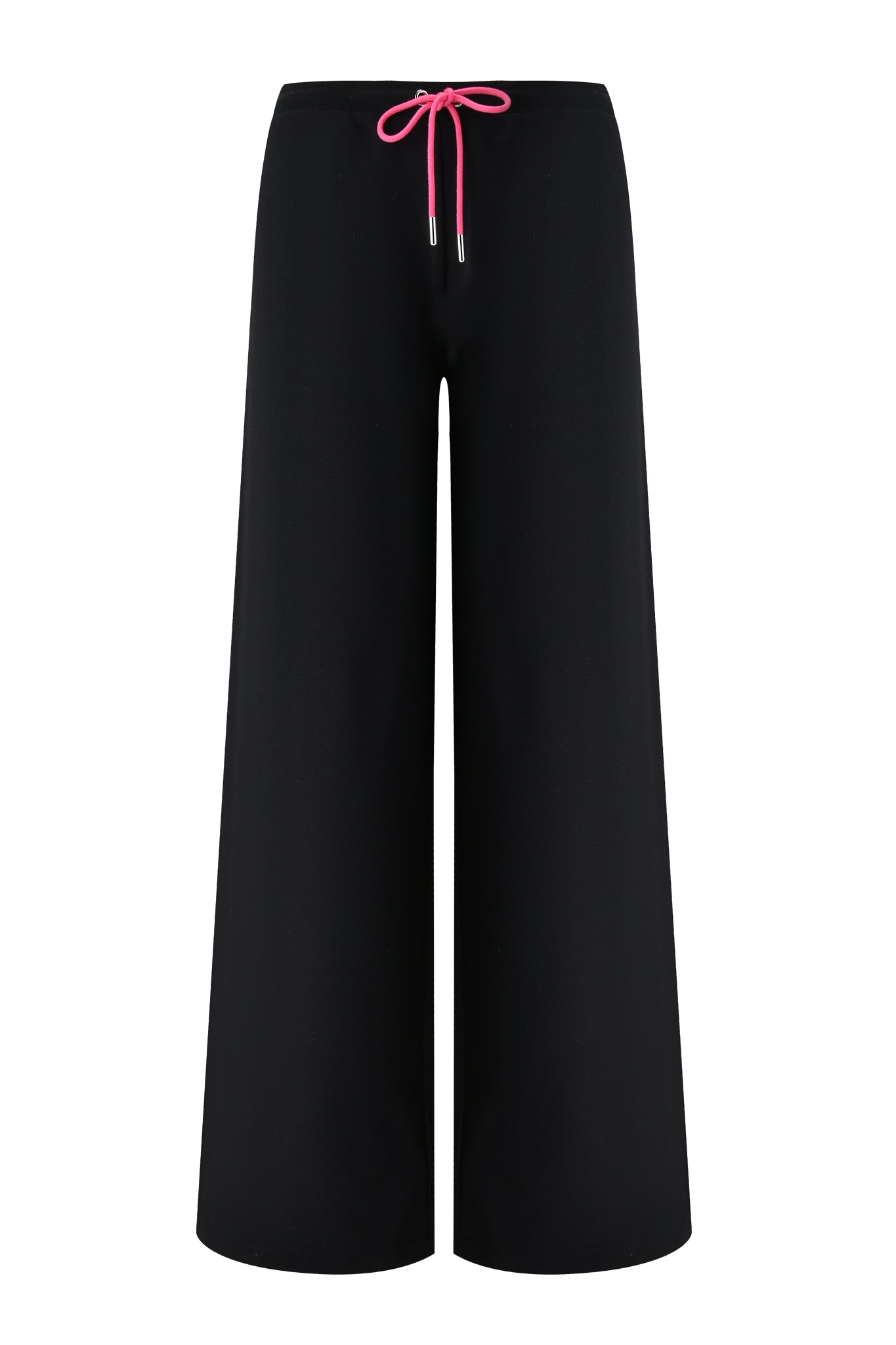 The I.AM.GIA ARLO TRACK PANT - BLACK features a relaxed, wide leg silhouette with a bright pink waist drawstring, shown on a plain white background.