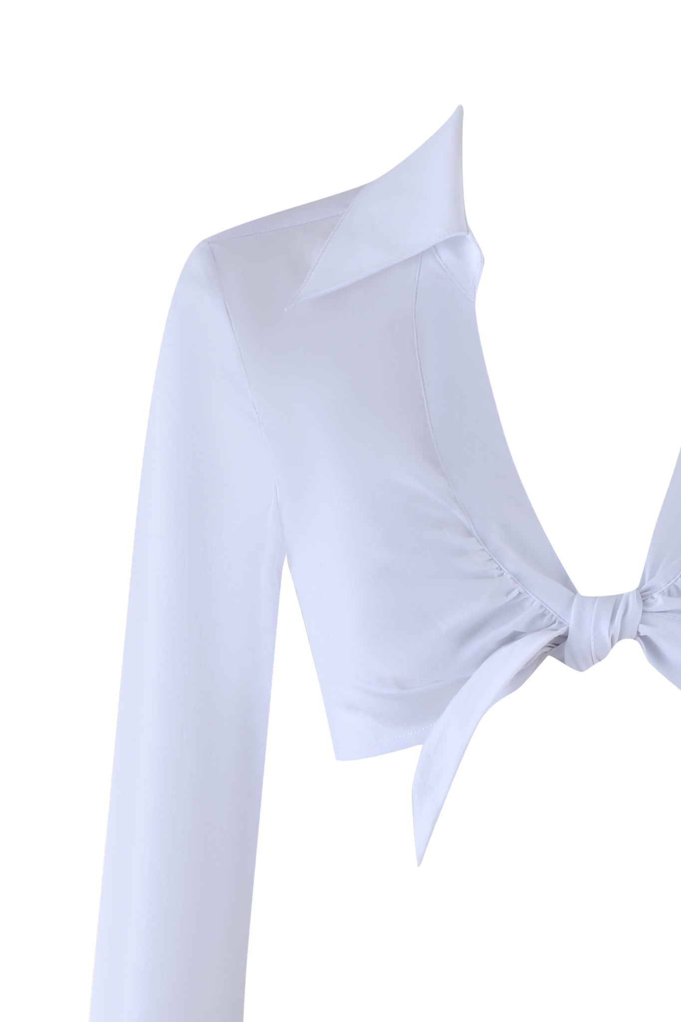 The I.AM.GIA MILLER TOP - WHITE is a super cropped blouse featuring long sleeves, a deep V-neck, and a large collar. It has a knotted tie detail at the front, while its soft and slightly shiny fabric provides a polished look with bralette-style allure.