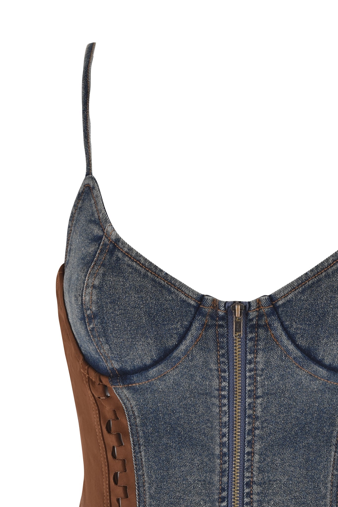 The FORREST BUSTIER by I.AM.GIA, in blue medium wash, features a front zipper, brown leather side panels with strap details, side lacing, adjustable thin shoulder straps, and a vintage washed effect for an edgy look.