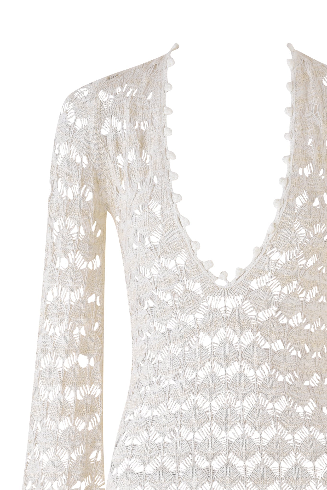 Close-up of the SIENNA MINI DRESS by I.AM.GIA in beige and cream, featuring a plunging V-neckline. The crochet knit showcases a geometric open-knit pattern with charming scalloped edges, resembling a sophisticated mini dress.