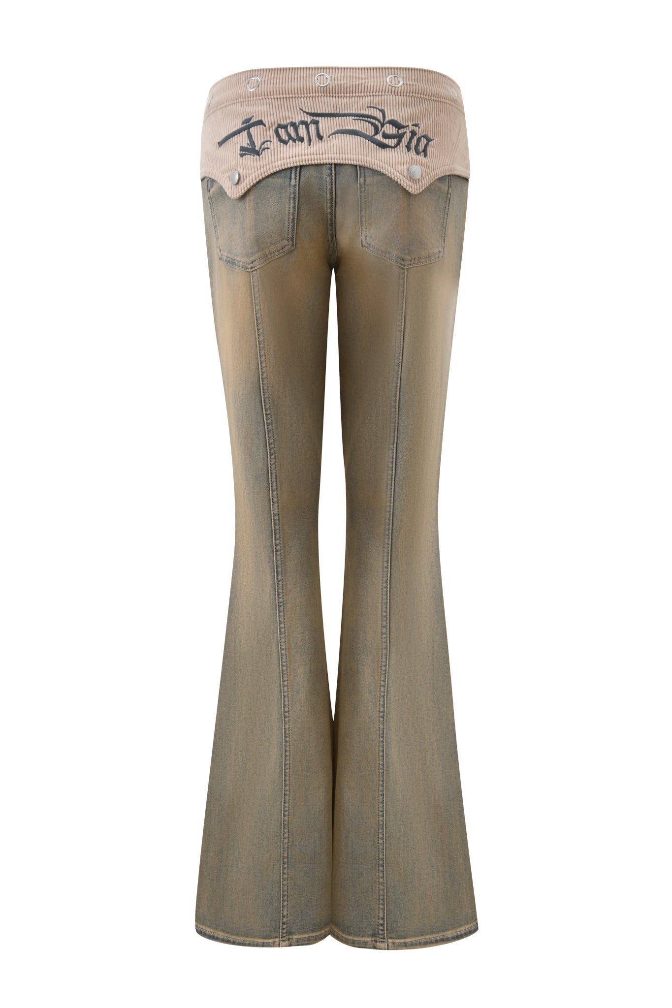 Back view of I.AM.GIA's TOMMIE JEAN - ANTIQUE DENIM flared pants in faded beige, with a mid rise waist, contrasting light tan waistband, and black gothic-style "Jean Bia" text.