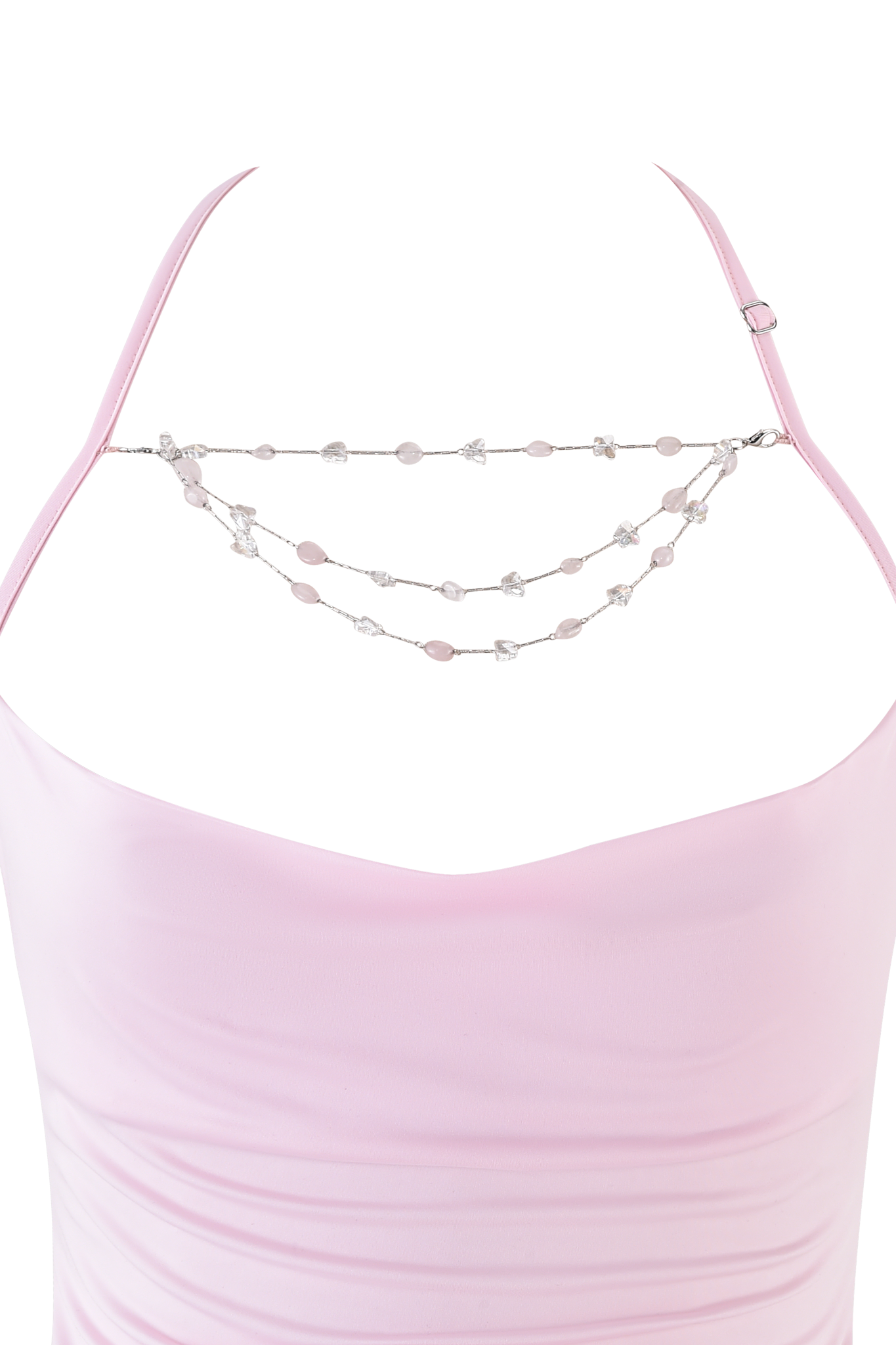 A close-up of the I.AM.GIA SORREL TOP in pink—a sleeveless halter top with a draped neckline, body-con fit, and two silver chains (including a sparkling crystal butterfly) accenting the upper chest.