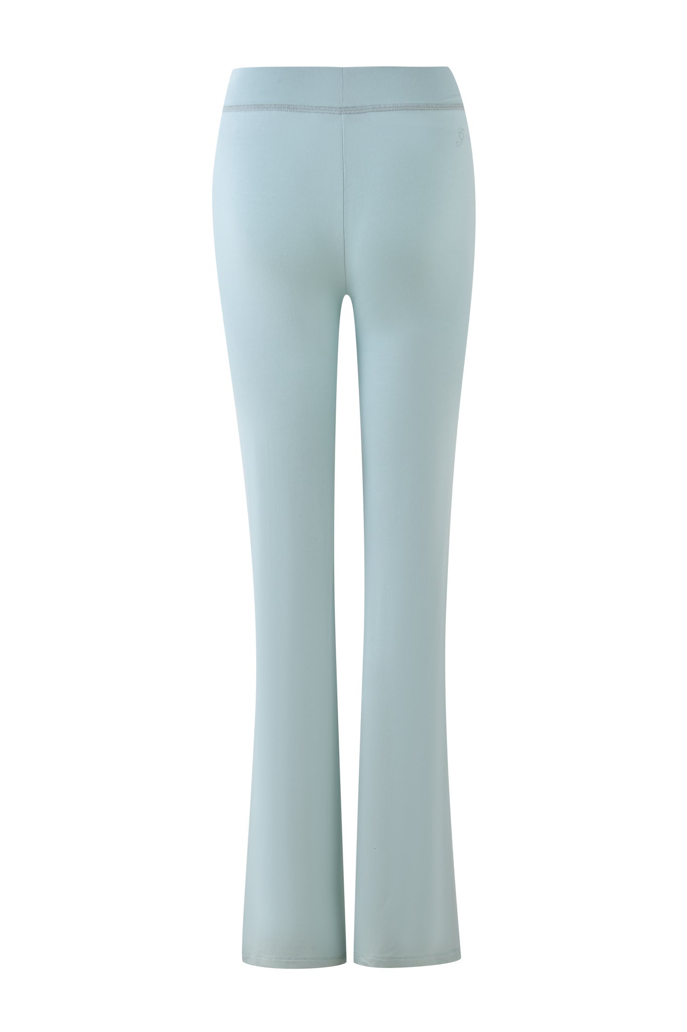 Introducing the I.AM.GIA BLARE TRACKPANT - SEAFOAM: light blue, high-waisted pants with a flared leg, shown from the back. Made from smooth bamboo and jersey fabric, perfect for active or casual wear with a minimalist design free of visible patterns or logos.