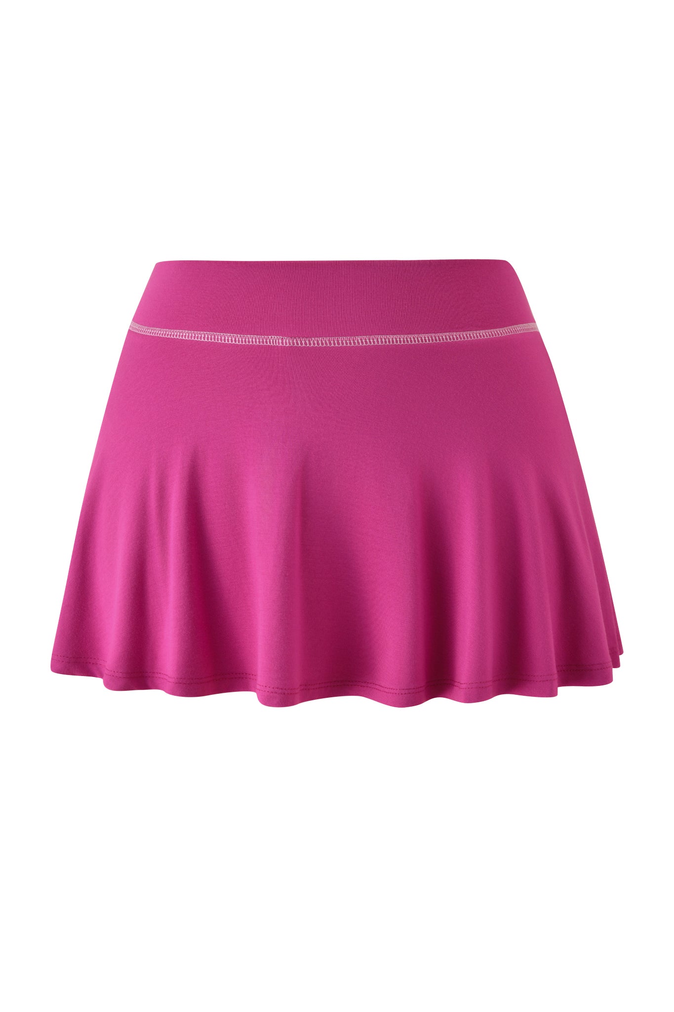 The I.AM.GIA BLARE SKORT in raspberry is a bright pink, flared mini skort with a fitted waistband and subtle top stitching, shown against a white background.