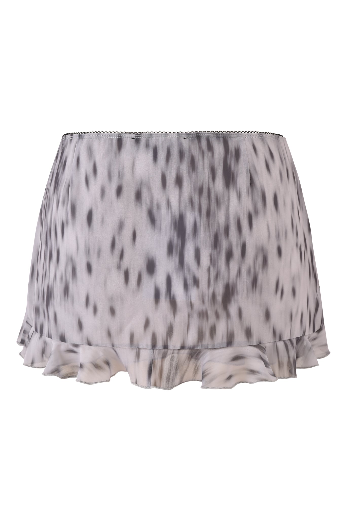 The COLETTE LACE PANEL MINI SKIRT by I.AM.GIA features a short, flowy silhouette with a black and white spotted leopard print and ruffled hem.