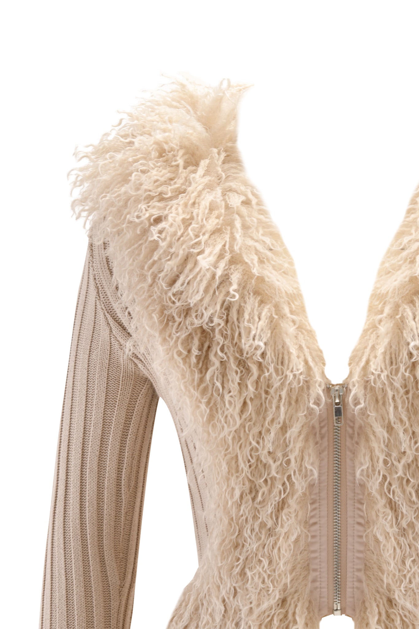 A close-up of the I.AM.GIA CRESSIDA JACKET - TAN, featuring a ribbed knit sweater sleeve, front zipper, and oversized shaggy faux fur collar and trim. Displayed on a white background.