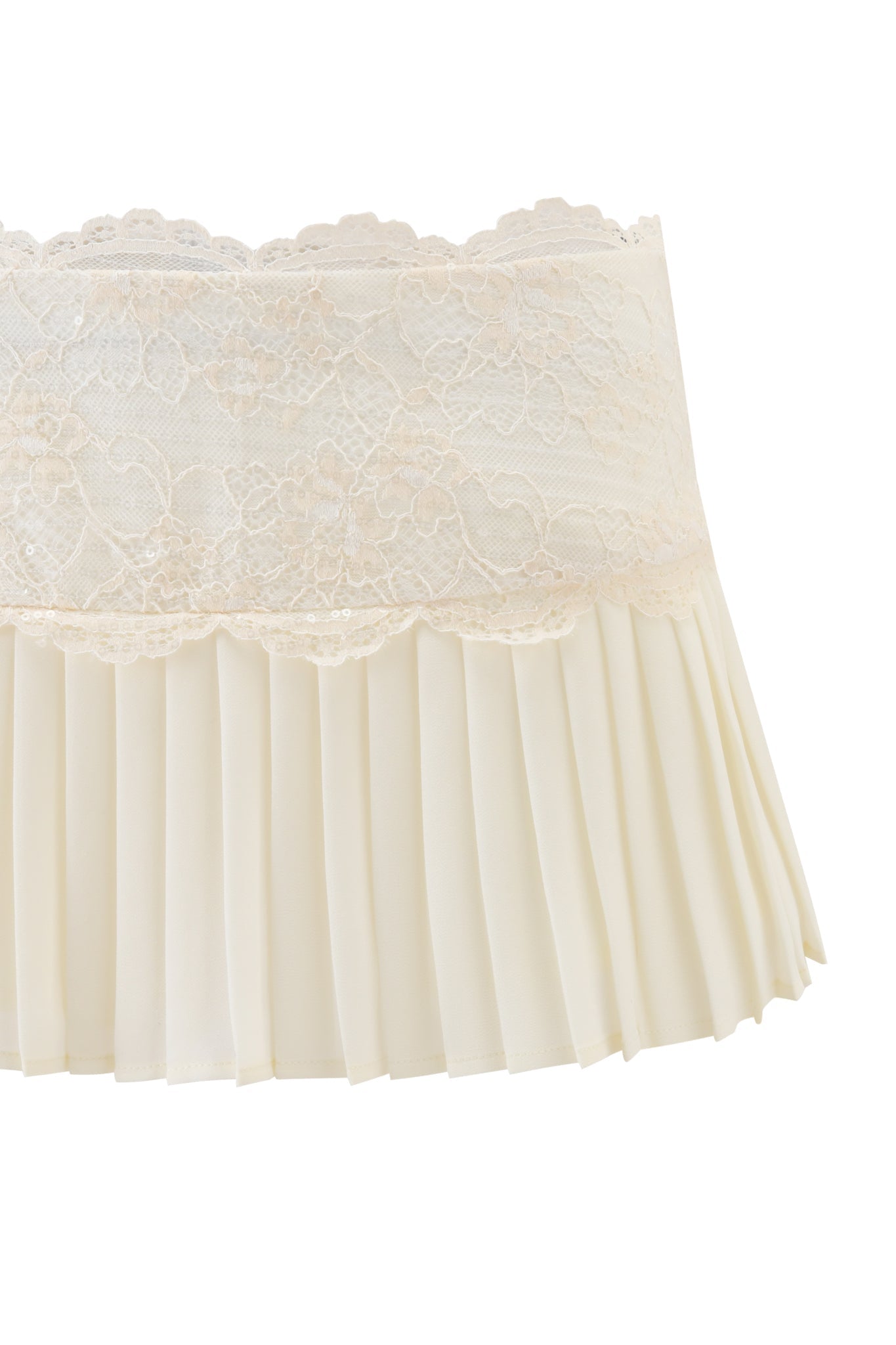 The SALOME MINI SKIRT - IVORY by I.AM.GIA is a cream micro-pleated mini skirt in ivory georgette, with a sequinned lace waistband overlay and a flowing lower section, shown against a white background.