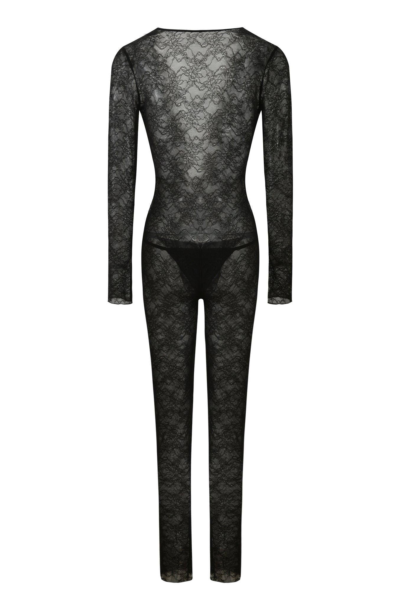 The I.AM.GIA TIGRA CATSUIT - BLACK is a full-length, long-sleeve sheer lace catsuit with a crew neckline and fitted silhouette, showcasing black underwear beneath the delicate lace fabric. Shown from the back.