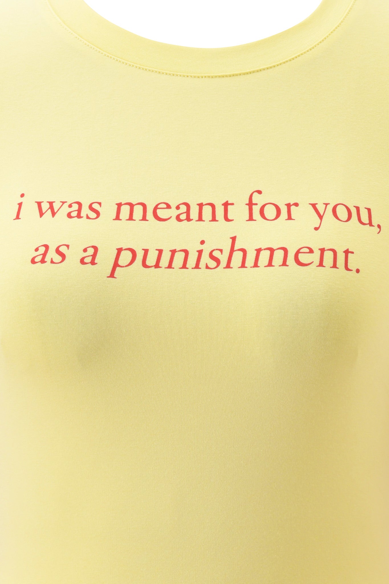 The POLINA TEE - PUNISHMENT by I.AM.GIA is a yellow baby tee with bold red text, "i was meant for you, as a punishment," bringing a quirky twist to your casual style.