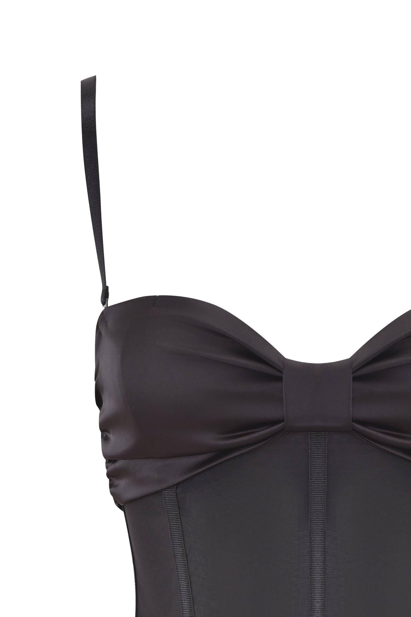 Close-up of the LIVY CORSET - BLACK by I.AM.GIA, featuring black mesh fabric, thin shoulder straps, and a large satin bow accent at the sweetheart neckline for a smooth, fitted look.