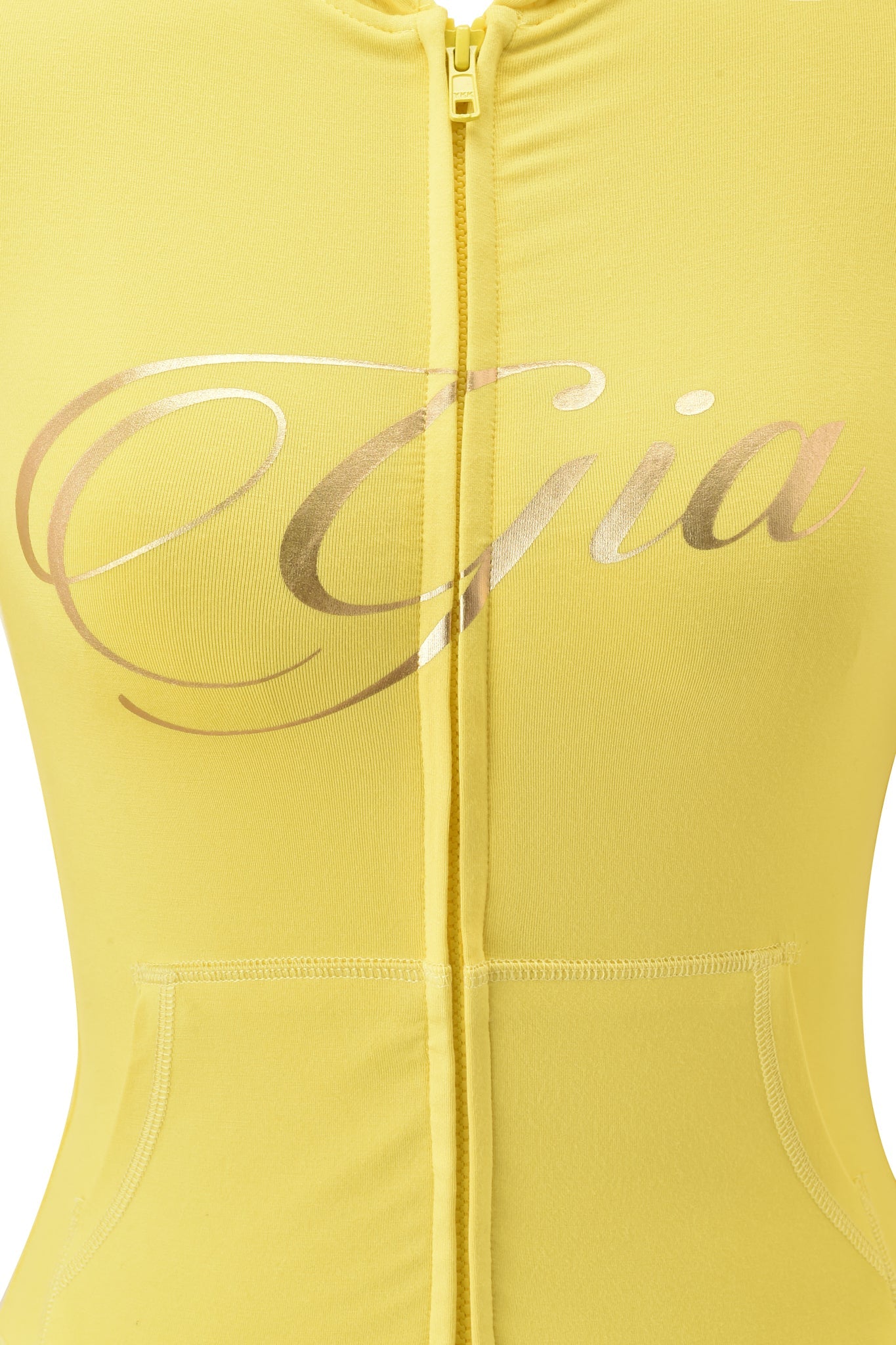 A close-up of the I.AM.GIA BLARE FORM POCKET HOODIE in yellow gold foil, featuring metallic "Gia" script across the chest, a centered zip, front pockets, and a stylish bodycon fit.