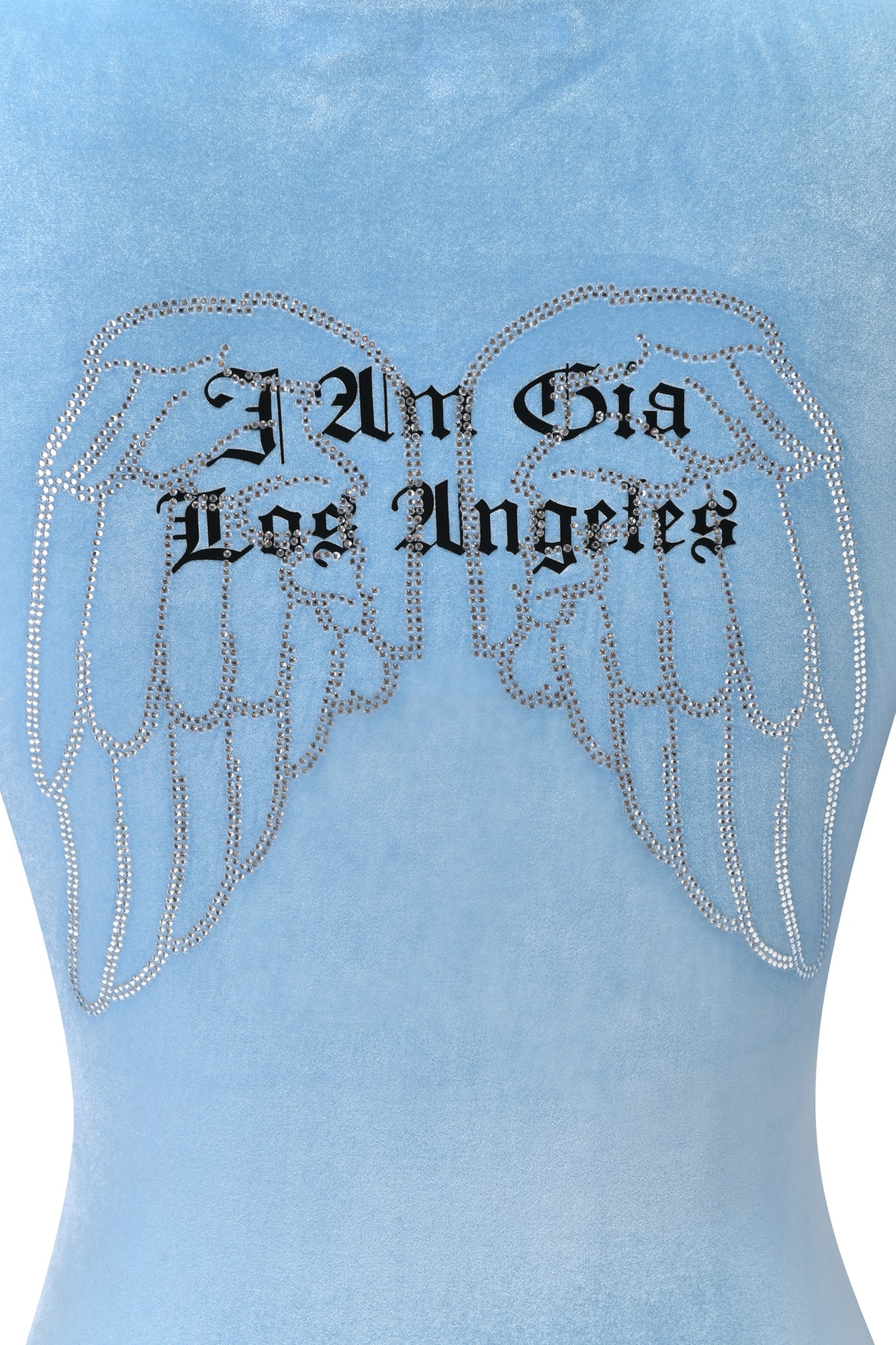 The BLARE VELOUR POCKET HOODIE in ice blue by I.AM.GIA features diamanté angel wings and black Gothic "I Am Gia Los Angeles" text on the back.