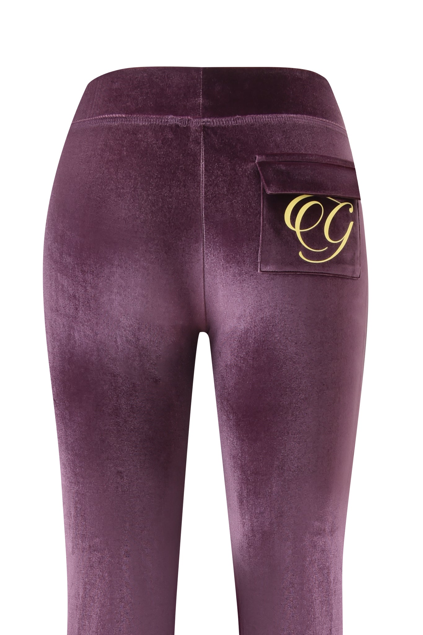 The image shows the back of the I.AM.GIA BLARE VELOUR POCKET TRACKPANT in purple, featuring a single right back pocket with a gold GIA script logo monogram design.