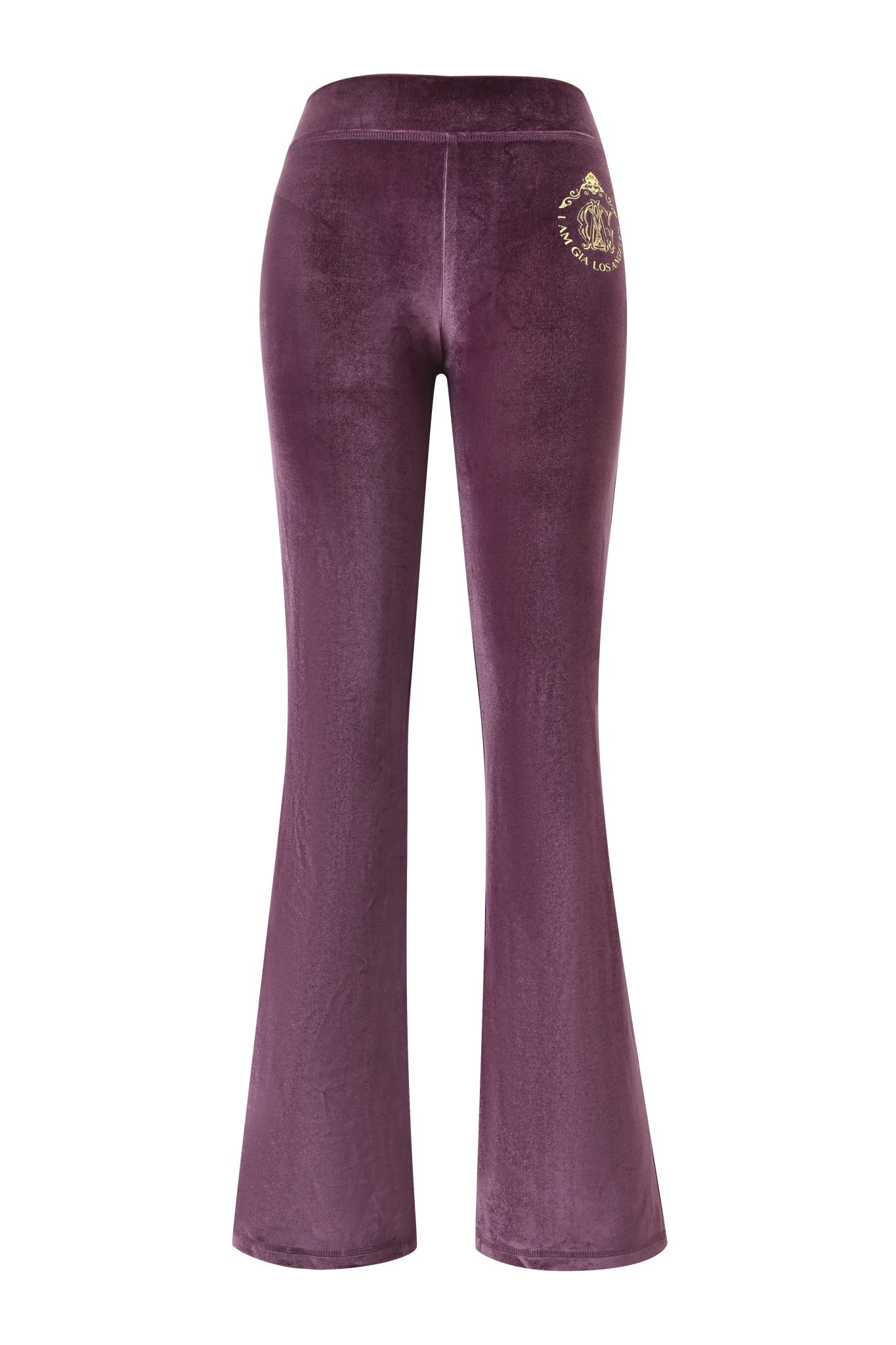 The BLARE VELOUR POCKET TRACKPANT by I.AM.GIA is a high-waisted, deep purple velour pant with flared legs, subtle sheen, and a small gold GIA script logo embroidered on the left hip.