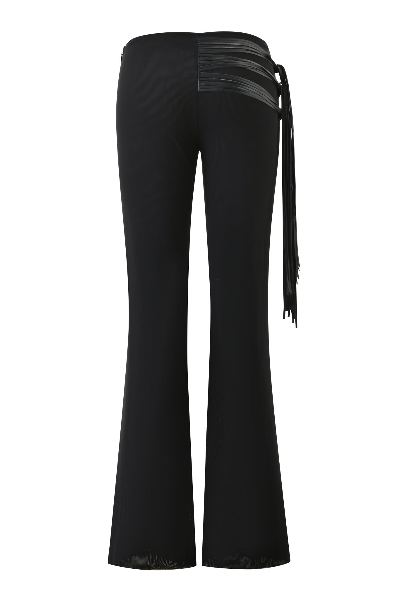 The ISELDA FRINGE PANT by I.AM.GIA in black features a shiny faux leather waistband, with fringe strands draping from one hip. The smooth fabric fits snugly through the hips and thighs, offering a bold, modern look from the back.