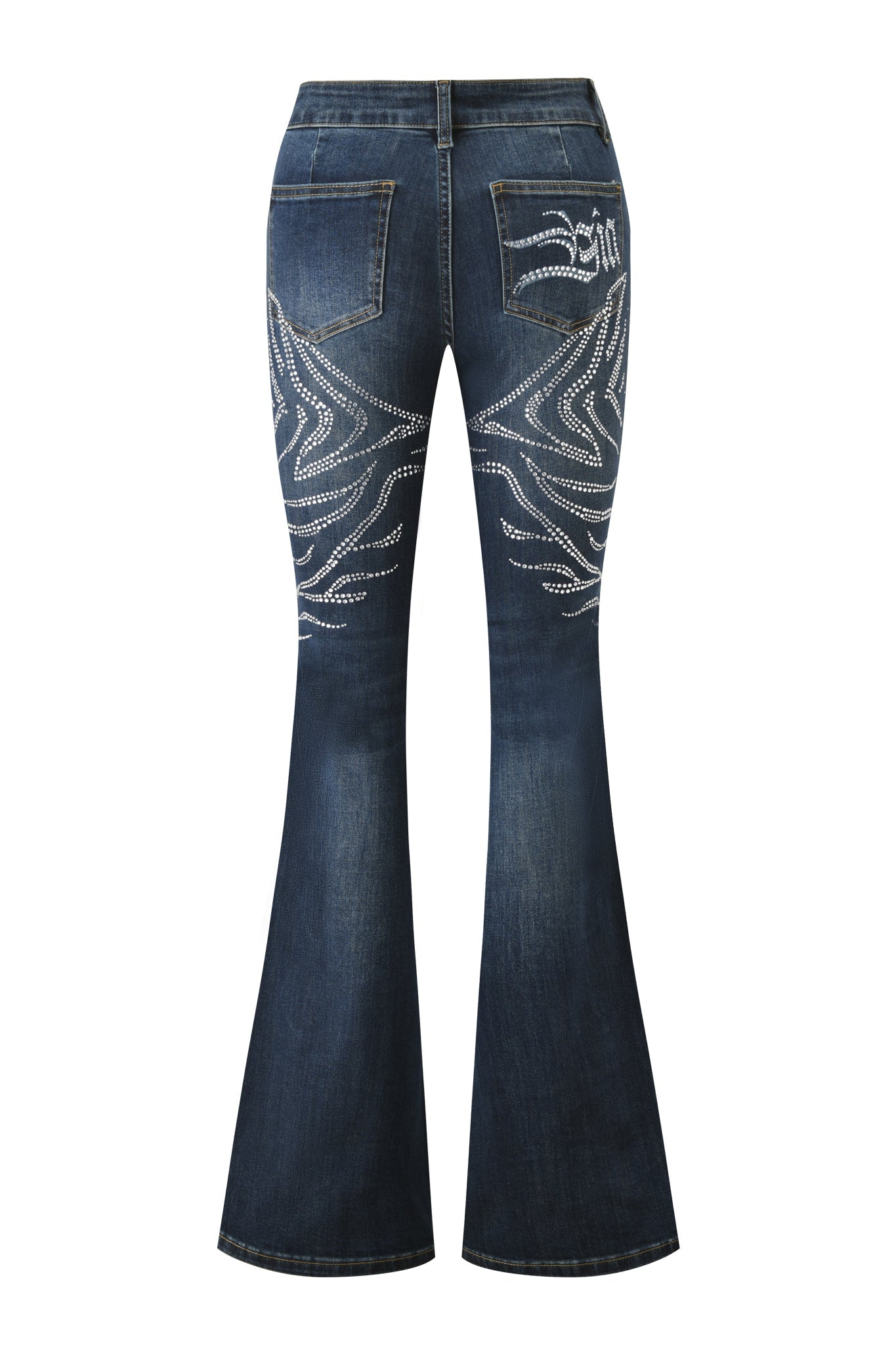 The I.AM.GIA JIJI DIAMONTE JEAN - BLUE features a low-rise bootcut fit, faded wash, visible pocket stitching, and swirling diamante embellishments across the back pockets and upper legs.
