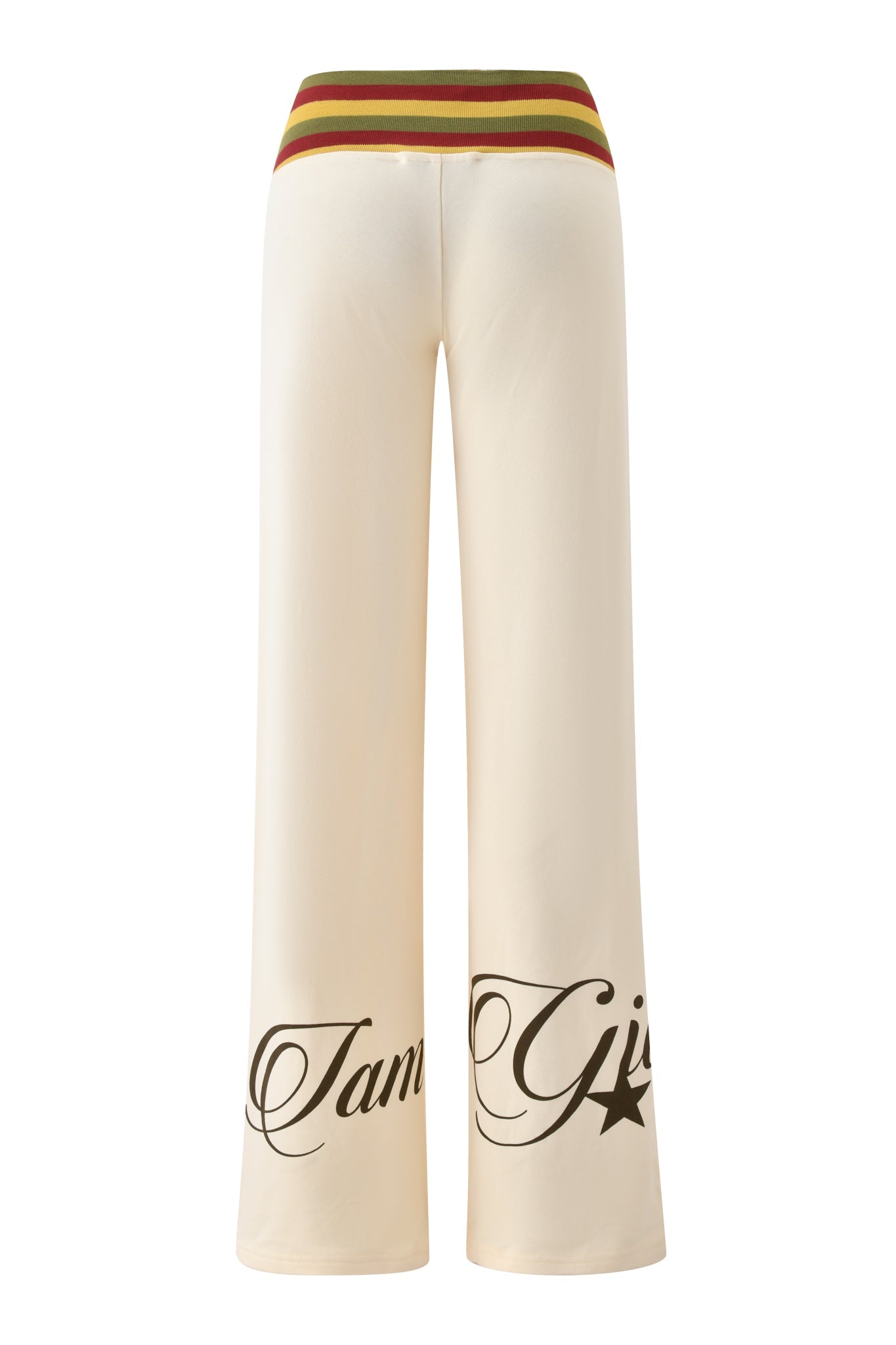 The I.AM.GIA CANDI PANT - CREAM features a cream wide-leg design with a tri-coloured ribbed waistband, soft loopback terry fabric, bold black cursive lettering on the lower legs, and a star graphic on the right leg.