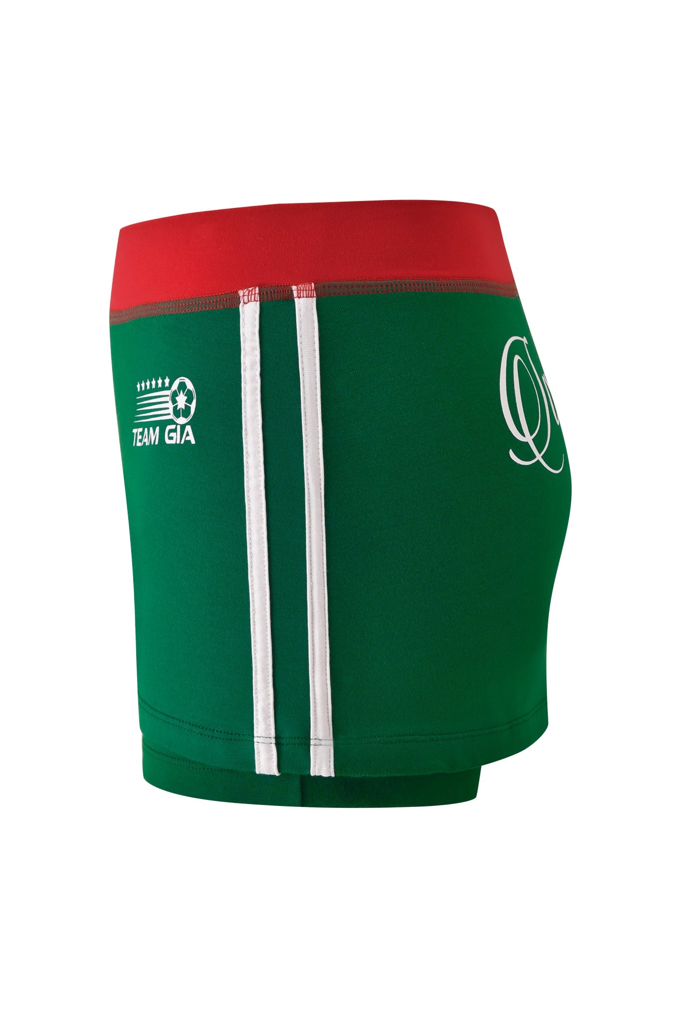 The BLARE VARSITY MICRO SKORT - GREEN by I.AM.GIA features white stripes, a red waistband, and side logos. Made from buttery-soft fabric, it includes a soccer ball with stars and "TEAM GIA" for a sporty touch.