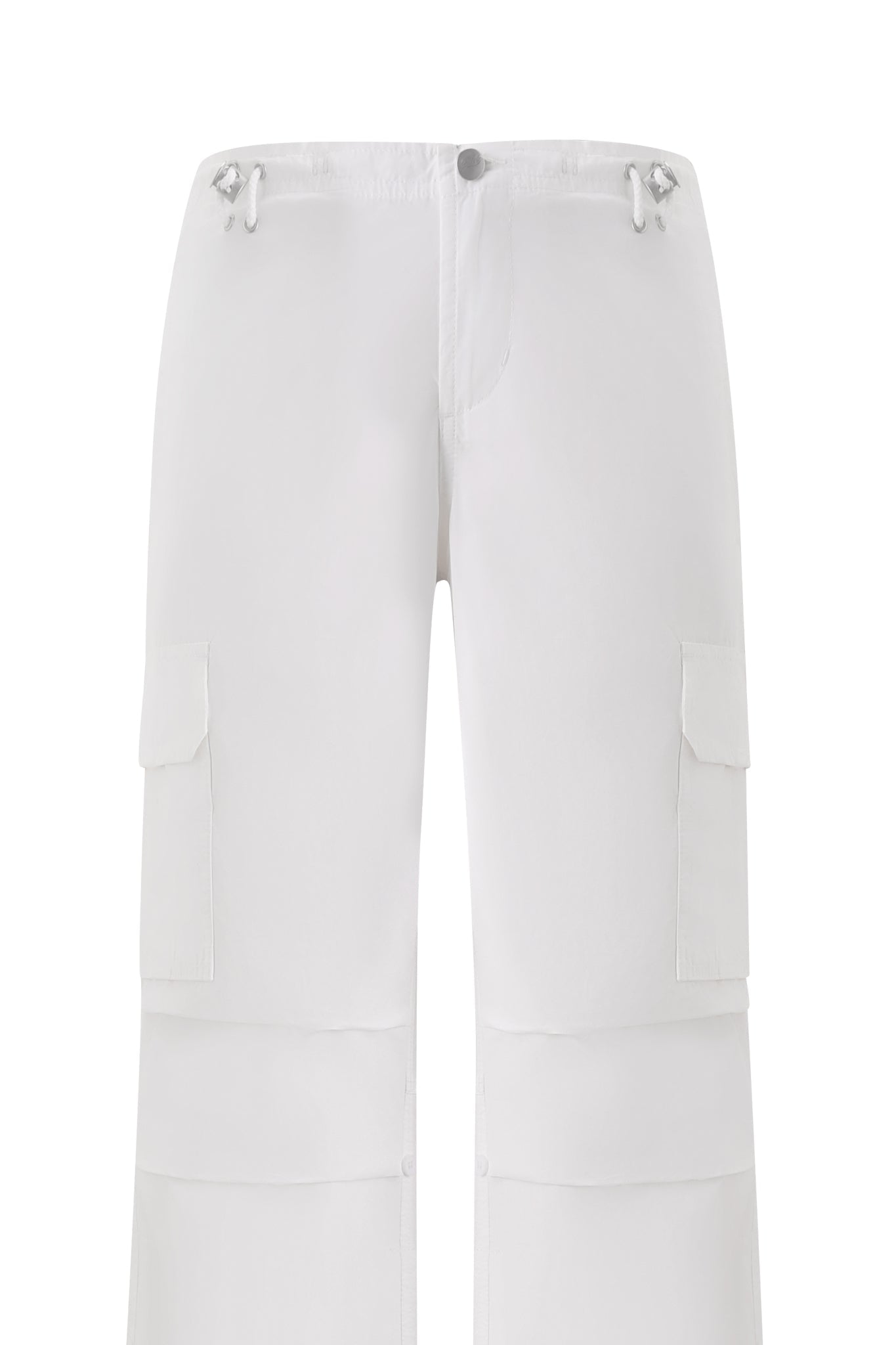 The IVANA CARGO PANT - WHITE by I.AM.GIA features an oversized fit, drawstring waist, button closure, and large flap pockets on each leg. These minimal cargo pants are shown against a plain white background.