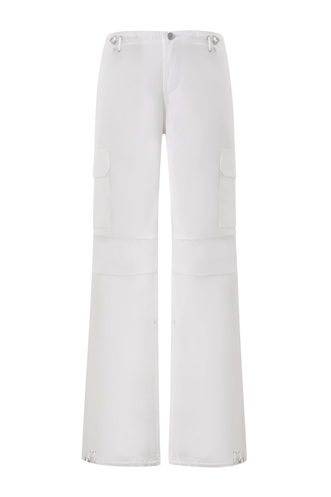 The IVANA CARGO PANT - WHITE by I.AM.GIA features a wide-leg, baggy fit with seam details above the knees, side flap pockets, button and zip closure, and drawstrings at the waist and hem.