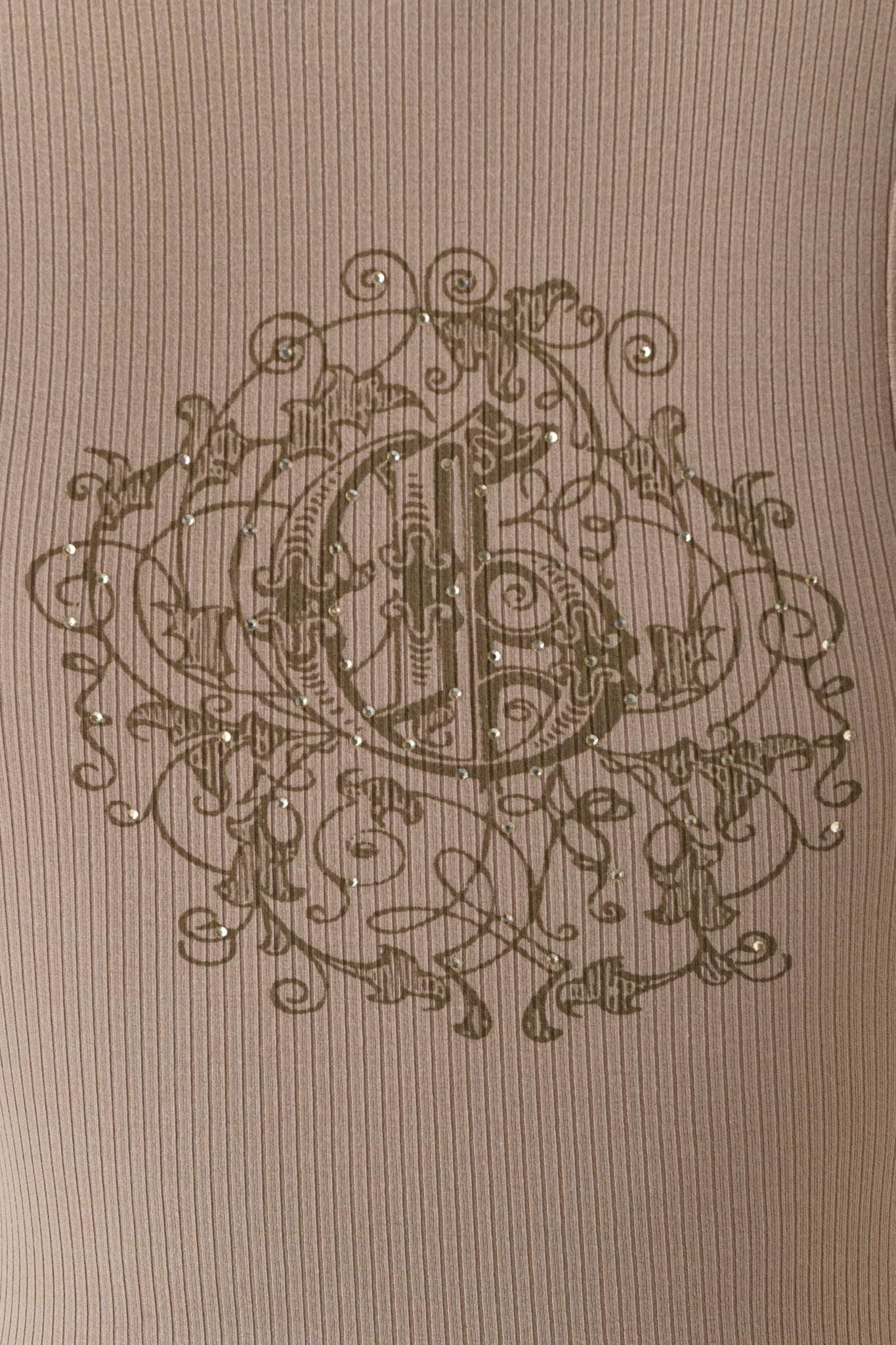 The INA TANK - MUSHROOM by I.AM.GIA features brown ribbed fabric in a racer style, highlighted by an ornate circular dark green pattern with swirling lines and sparkling rhinestones at the center.