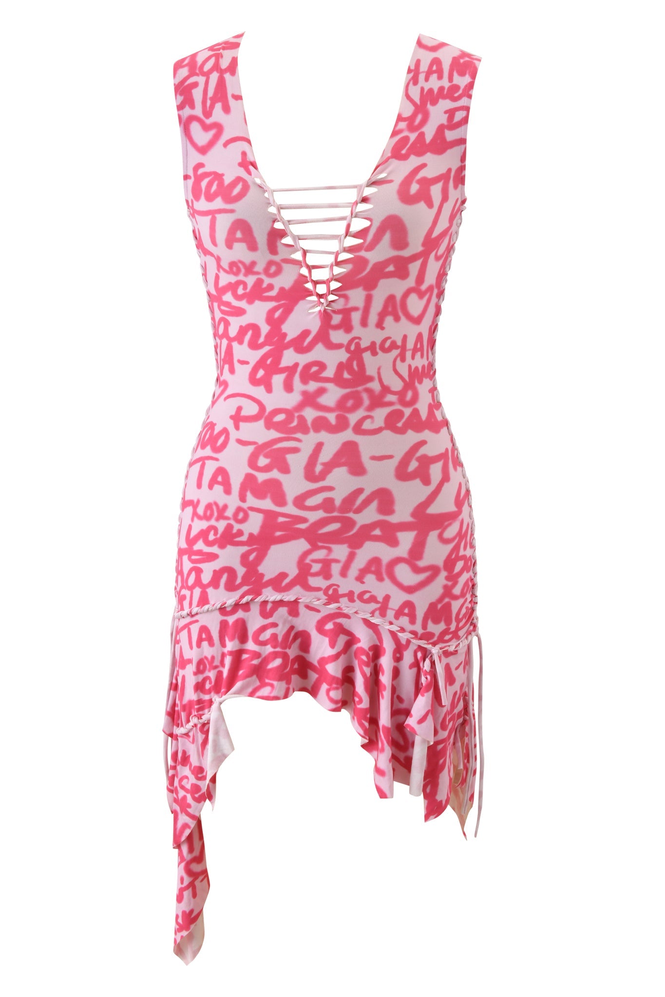 The HONEY MACRAME MINI DRESS by I.AM.GIA features a sleeveless hot pink design with abstract writing, deep V-neck with crisscross laces, and an asymmetrical ruffled hem.
