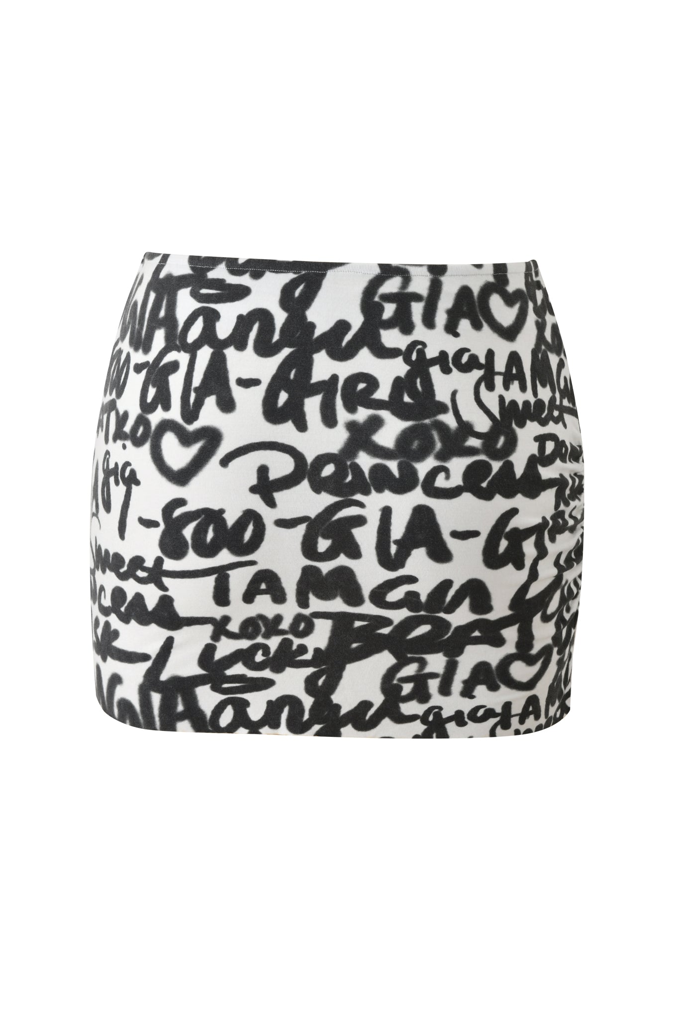 The I.AM.GIA HONEY MACRAME MINI SKIRT - WRITING ON THE WALL features bold black handwritten-style text and heart doodles on white fabric for a playful graffiti-inspired look.