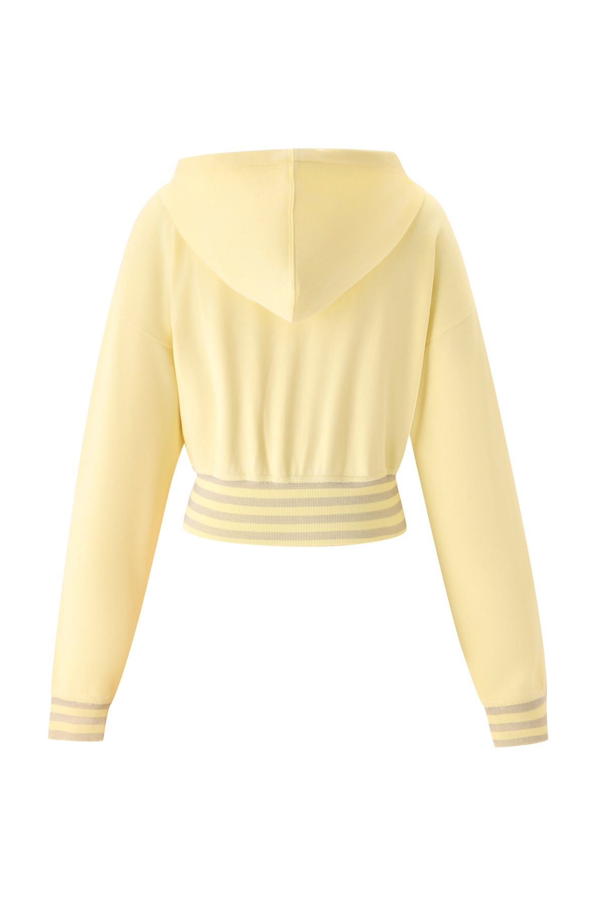 The VEDA JACKET by I.AM.GIA is a light yellow cropped zip-up hoodie with long sleeves, a fitted waistband, and grayish-white striped accents on the waist and cuffs, shown from the back.