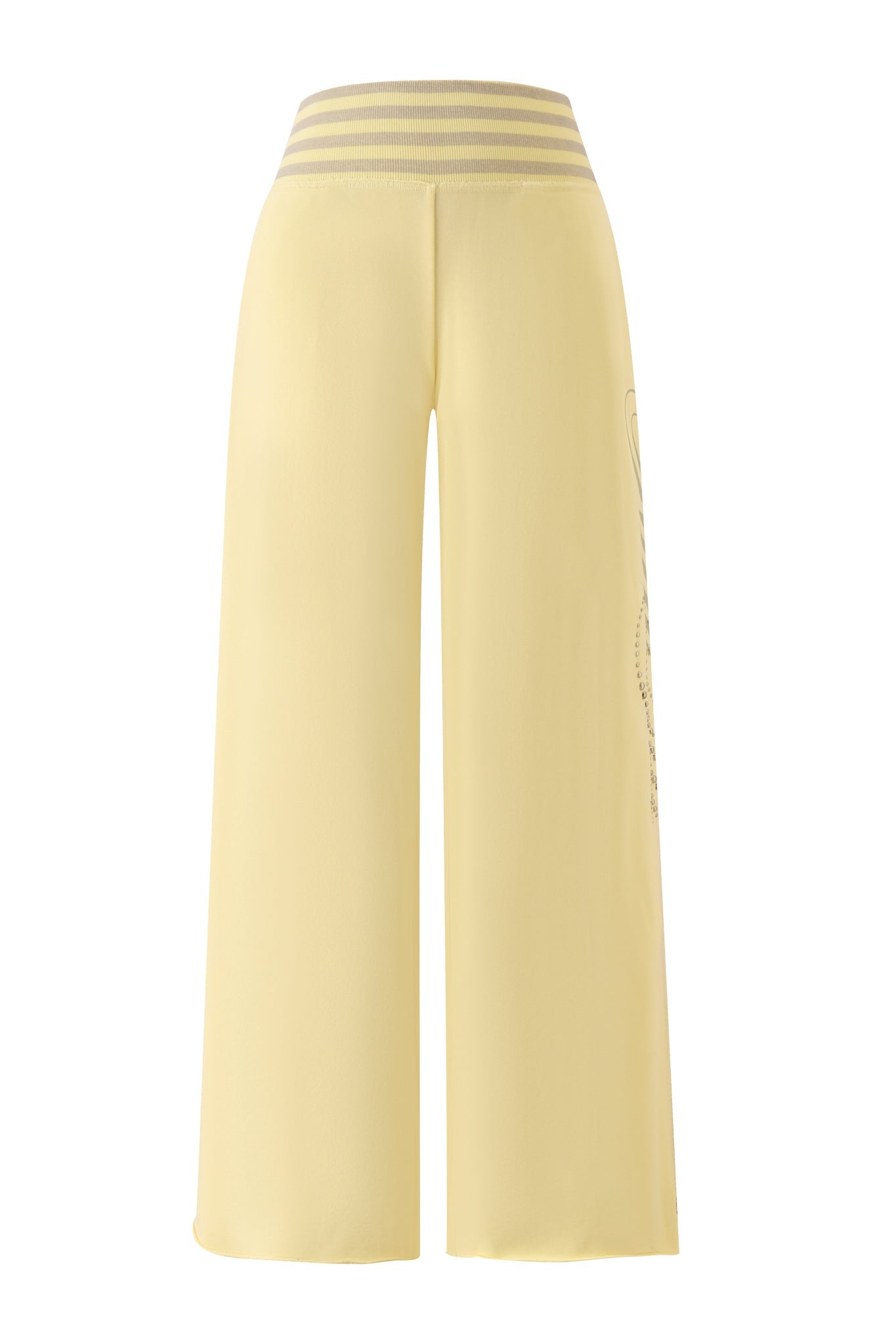 The VEDA PANT - YELLOW by I.AM.GIA features a high-waisted, wide-leg silhouette in yellow with a comfortable, stretchy waistband accented by two light gray horizontal stripes. The pants offer a loose, flowy fit with minimal visible detailing.