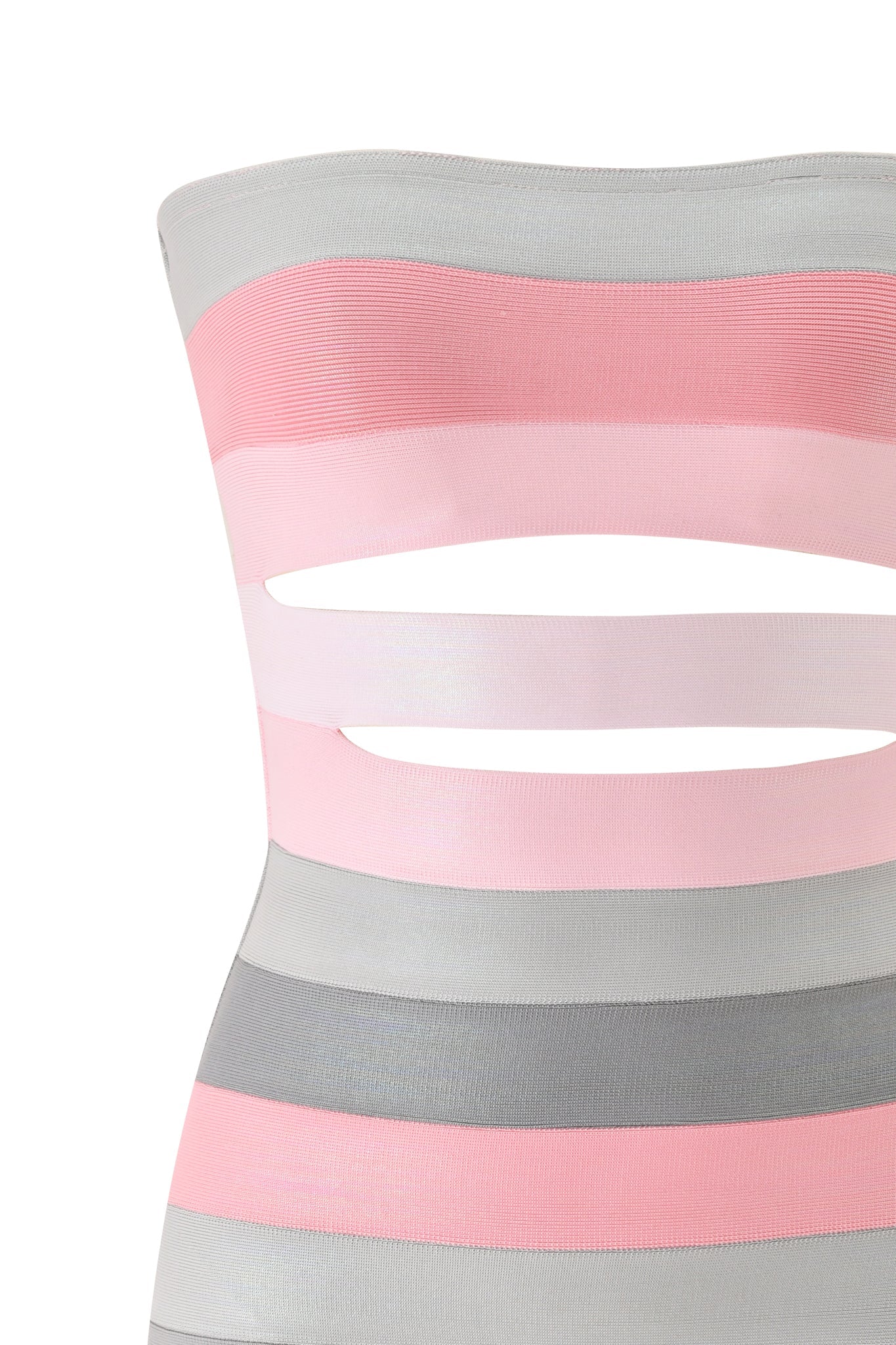 Close-up of the I.AM.GIA ZUNA PLATINUM BANDAGE MINI DRESS in pink with pastel horizontal bands, two waist cutouts, and a strapless design that flatters the figure. No visible background.