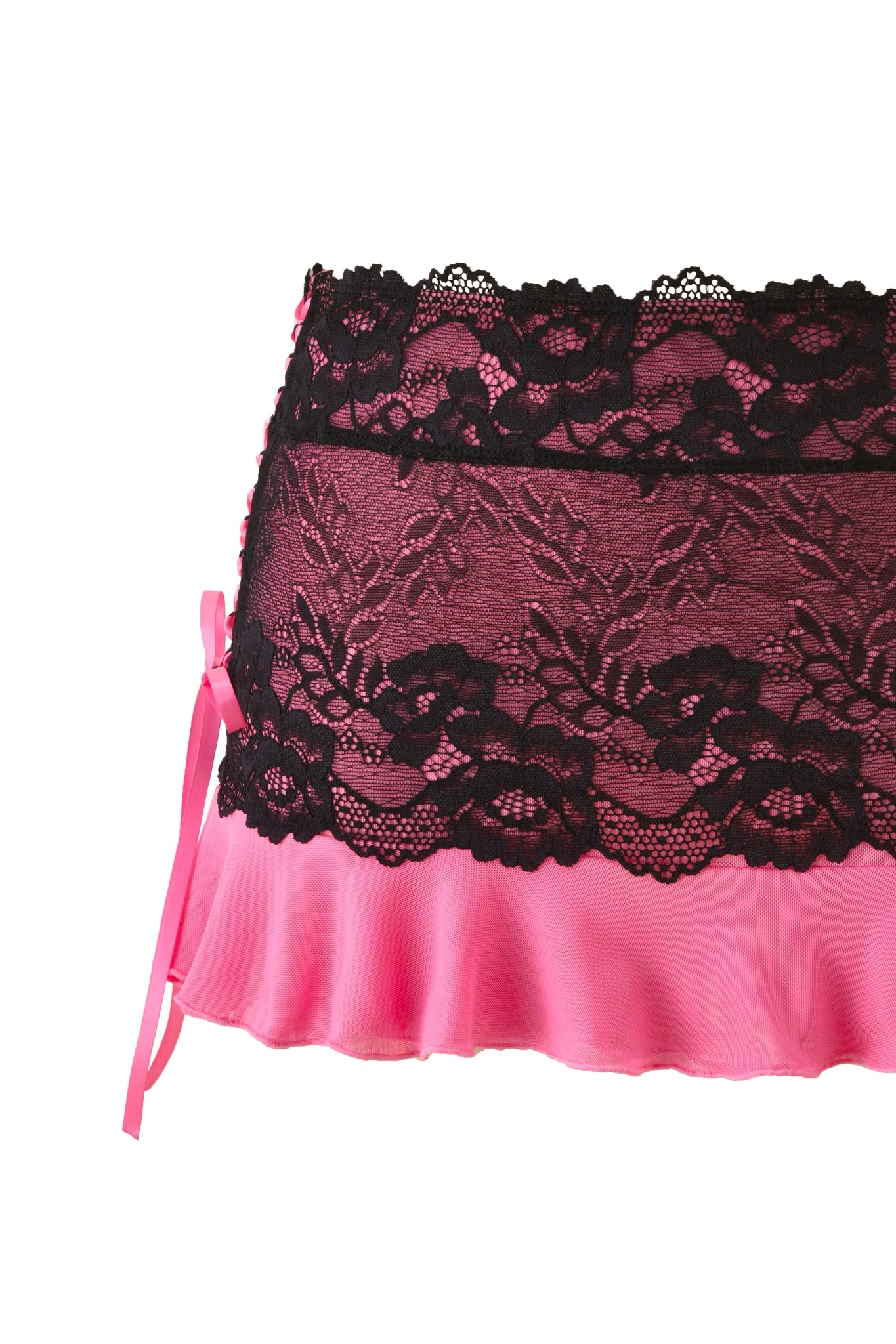 A close-up of the TIFFANY SKIRT - PINK by I.AM.GIA, a hot pink mesh mini skirt with a wide black lace waistband and a small bow on the left side, styled against a white background.